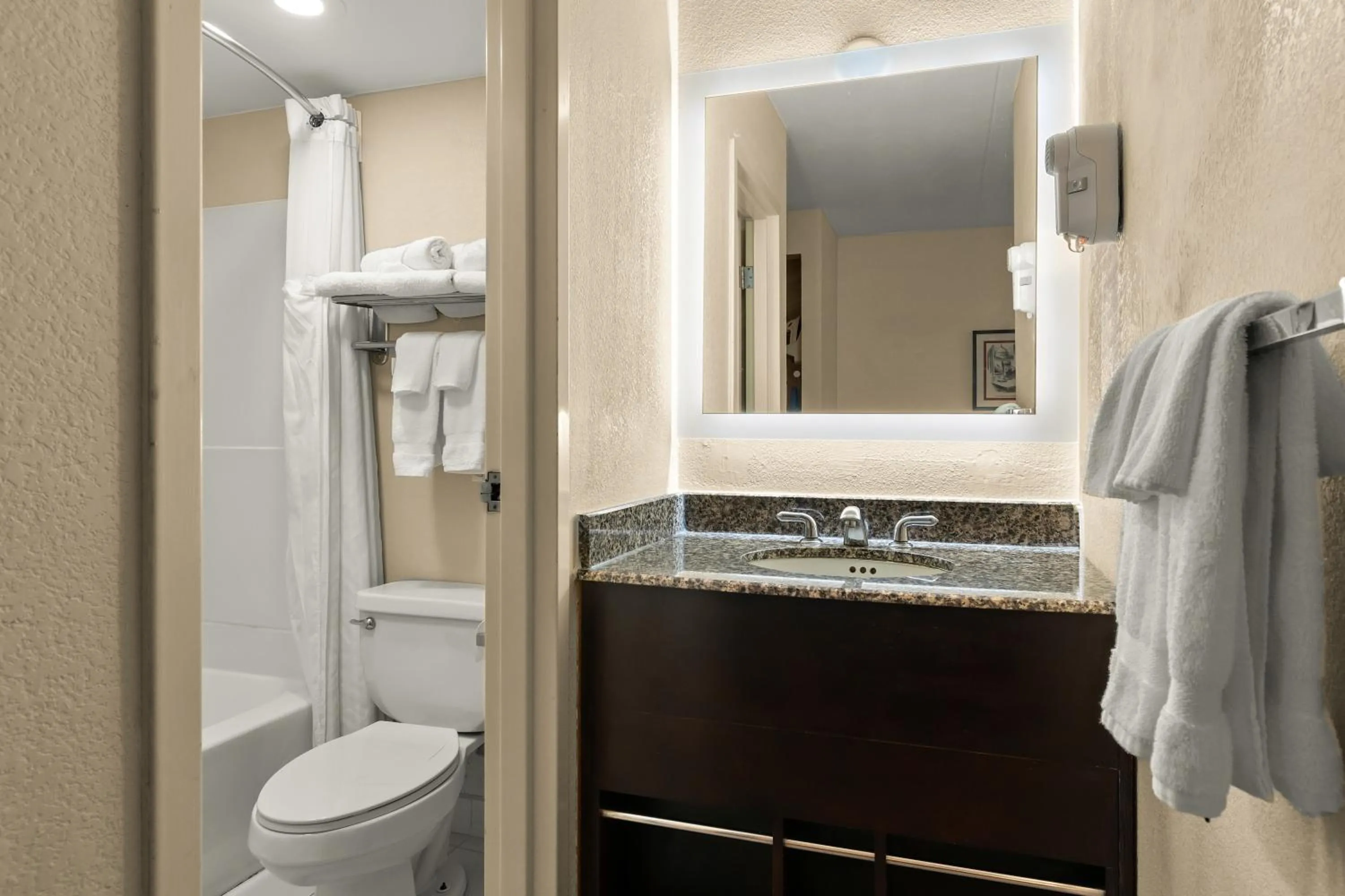 Toilet in Ramada by Wyndham Harrisburg/Hershey Area