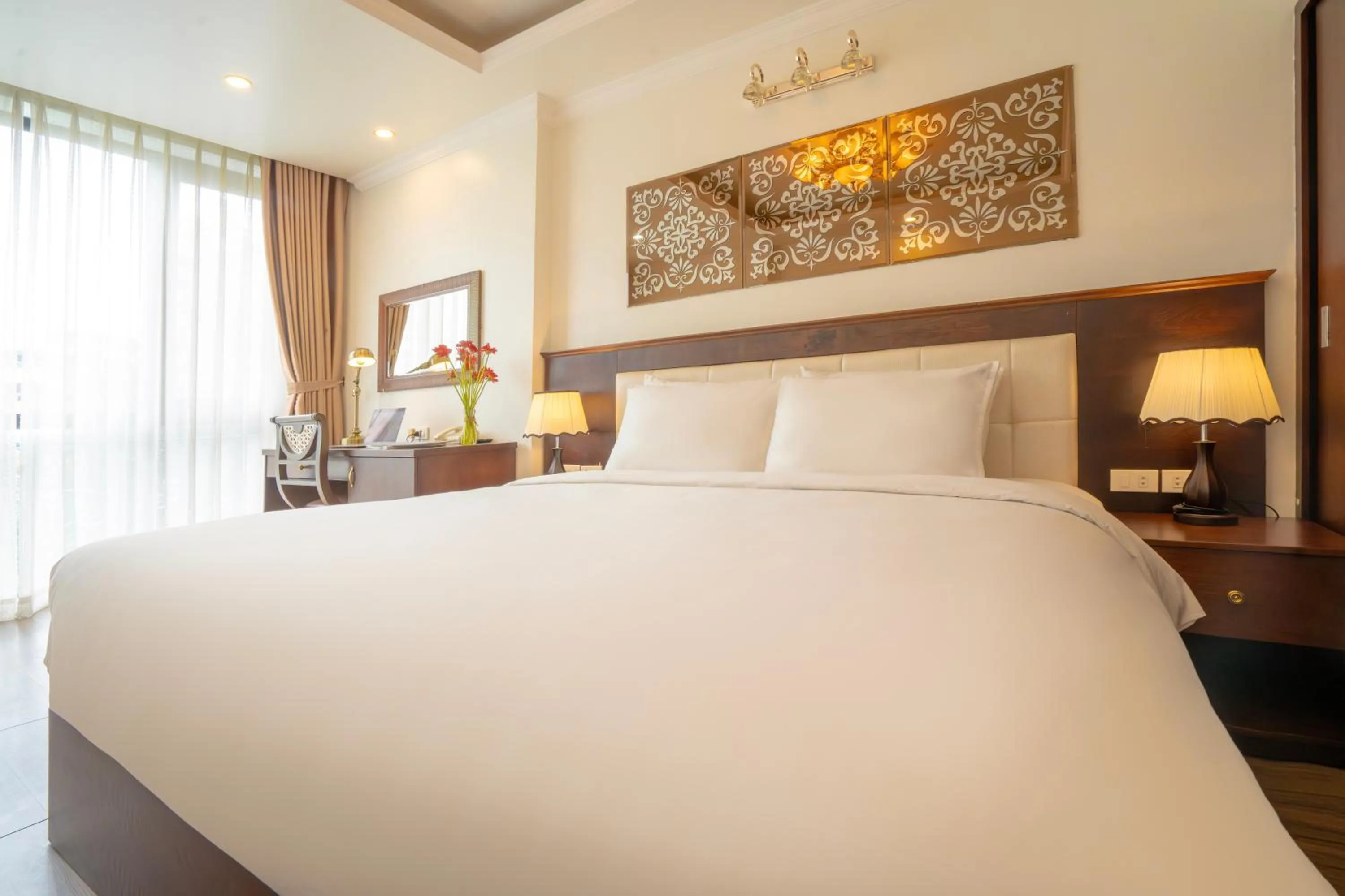 Bed in Du Palace Hotel & Travel