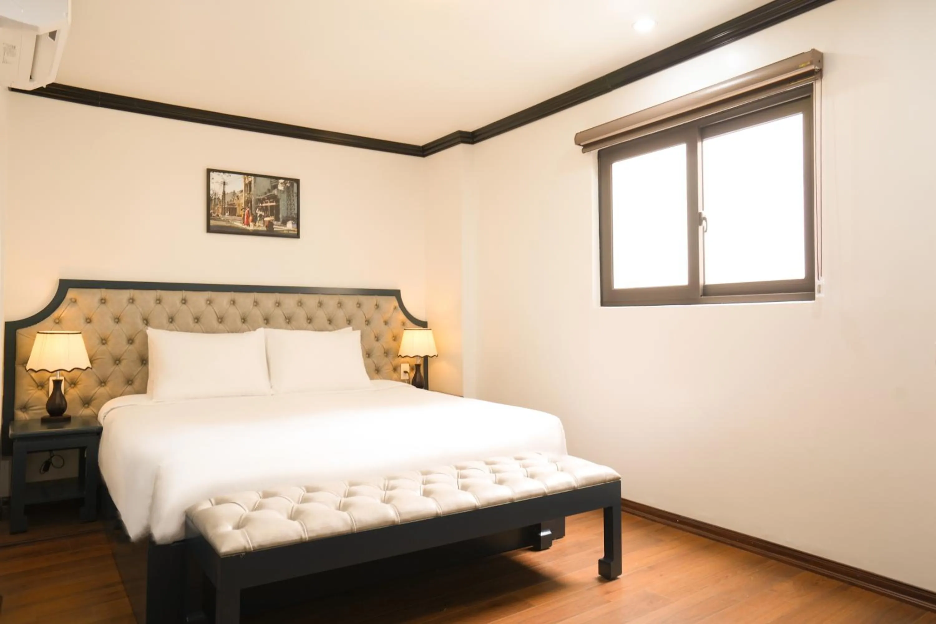 Bed in Du Palace Hotel & Travel