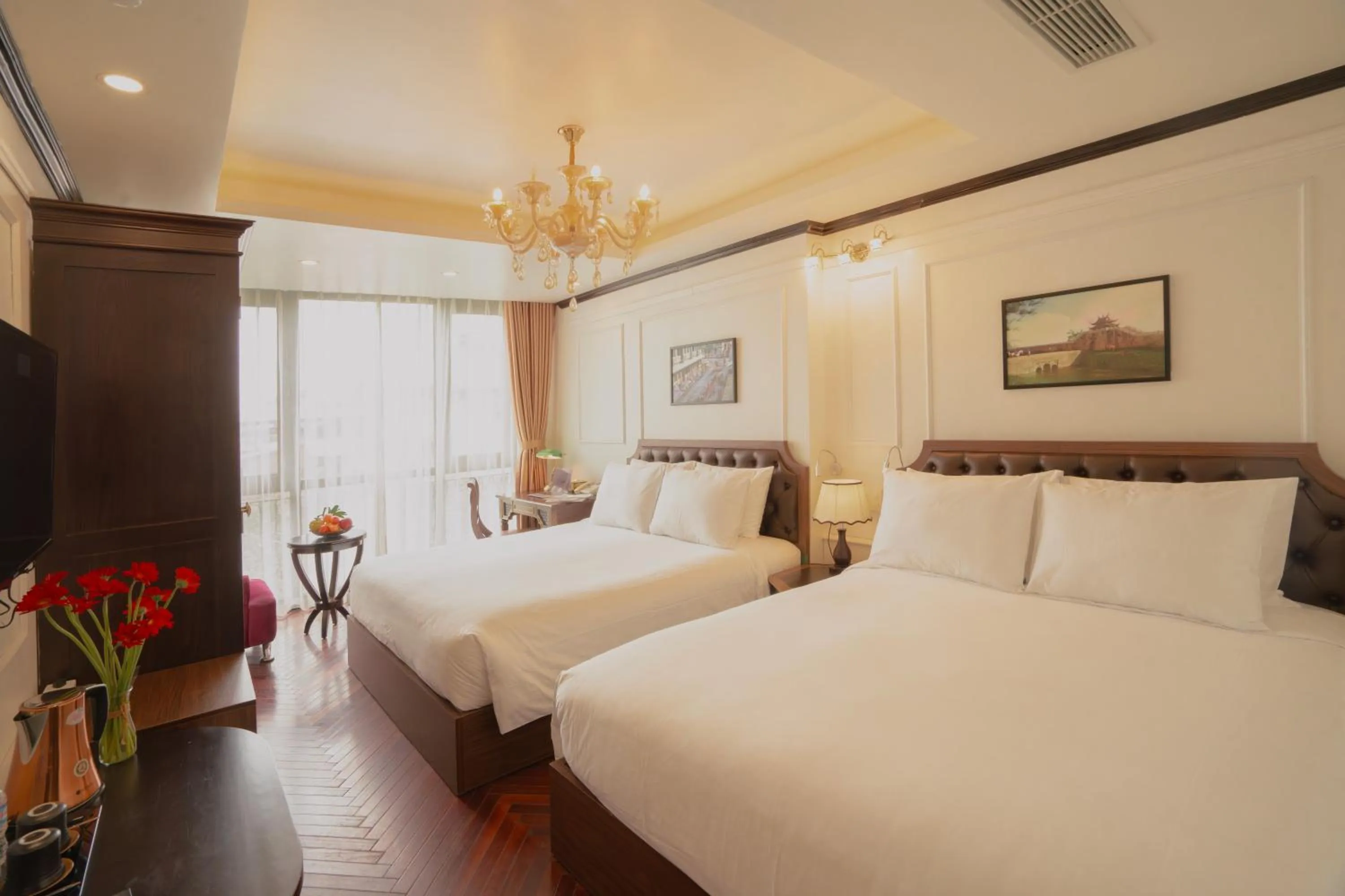 Bed in Du Palace Hotel & Travel