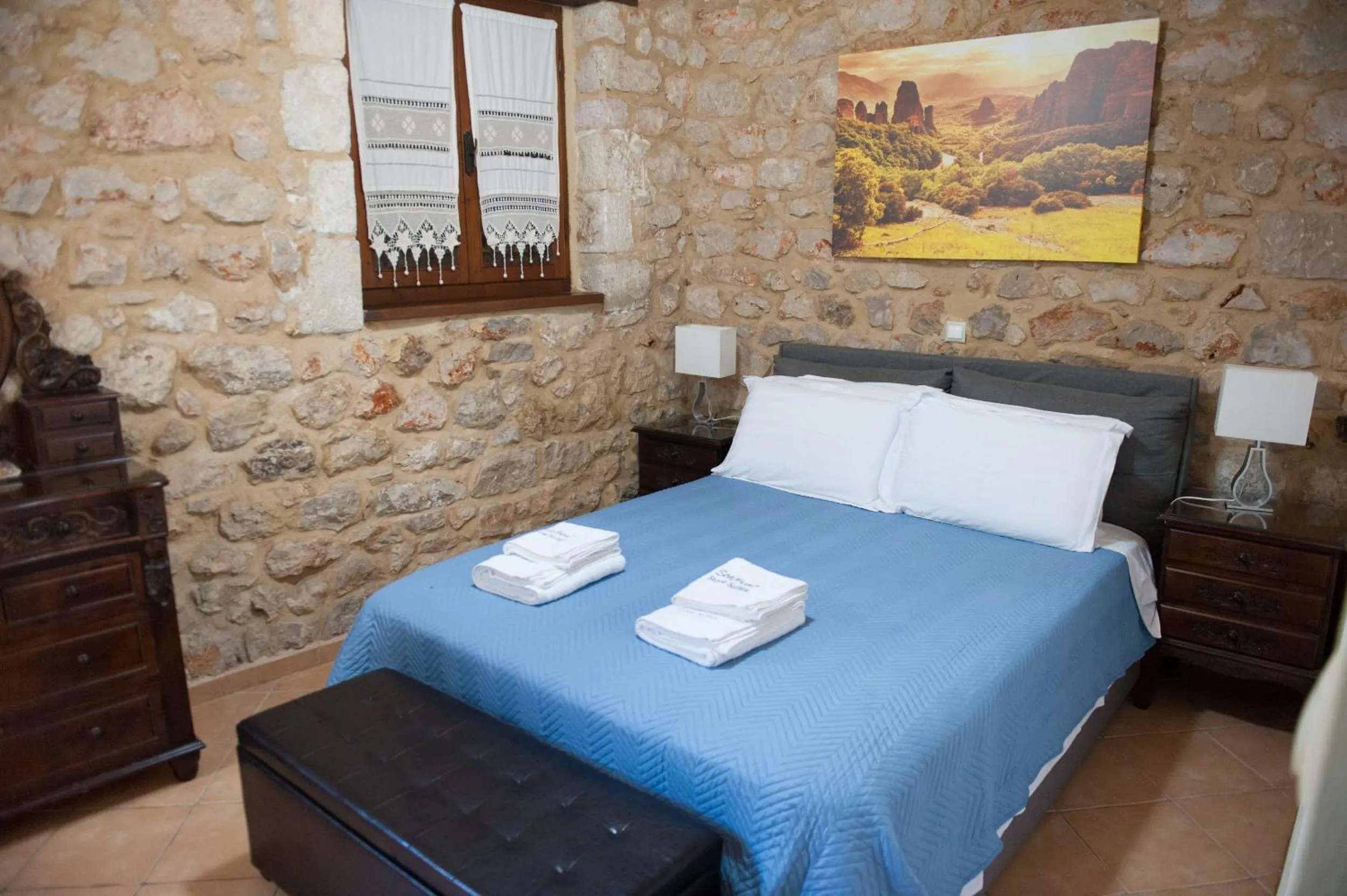 Photo of the whole room, Bed in SeaFront Stone Suites