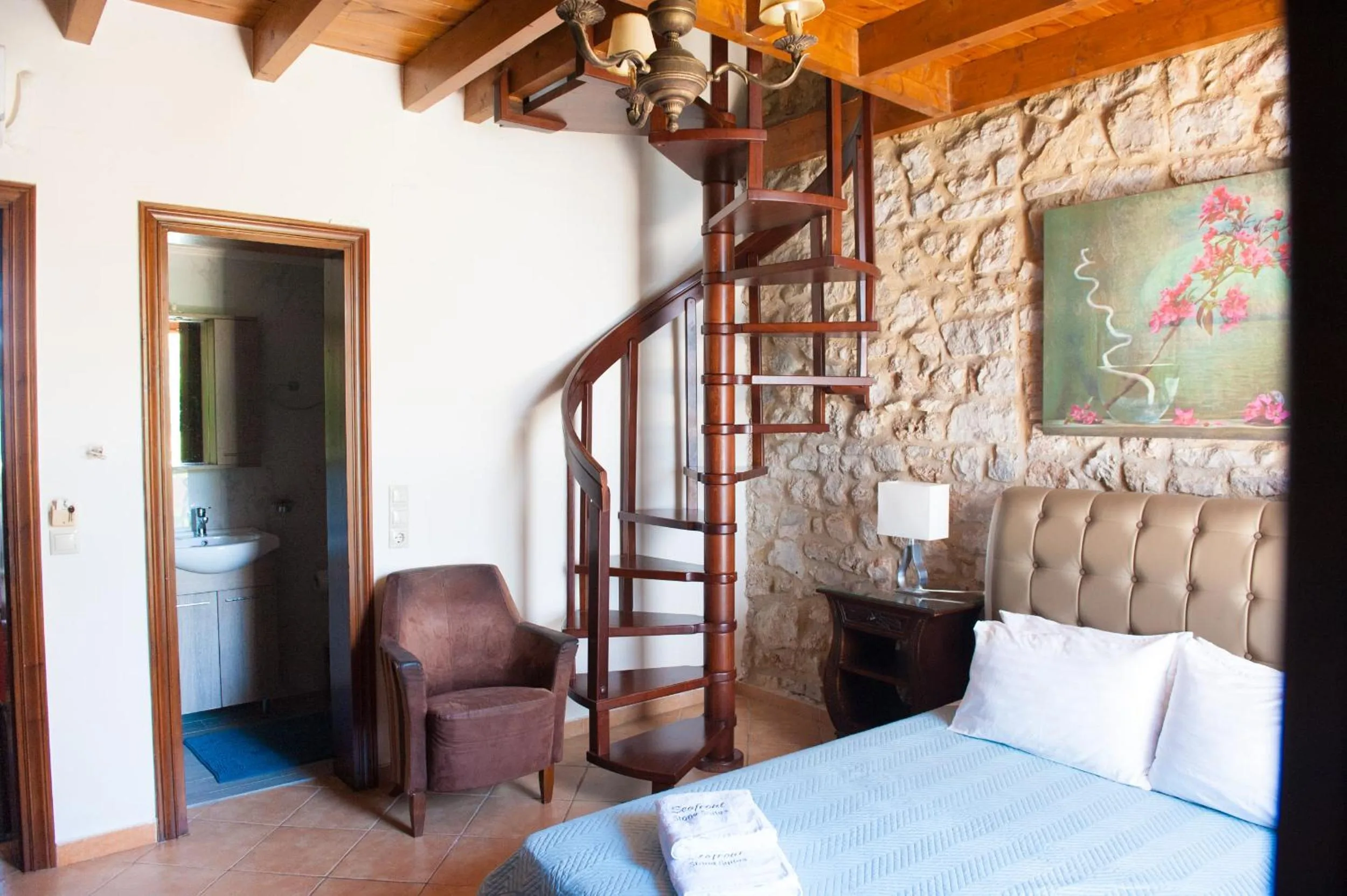 Photo of the whole room in SeaFront Stone Suites