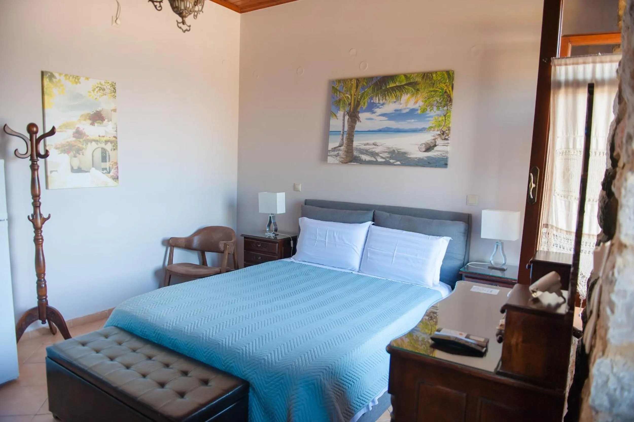 Photo of the whole room, Bed in SeaFront Stone Suites