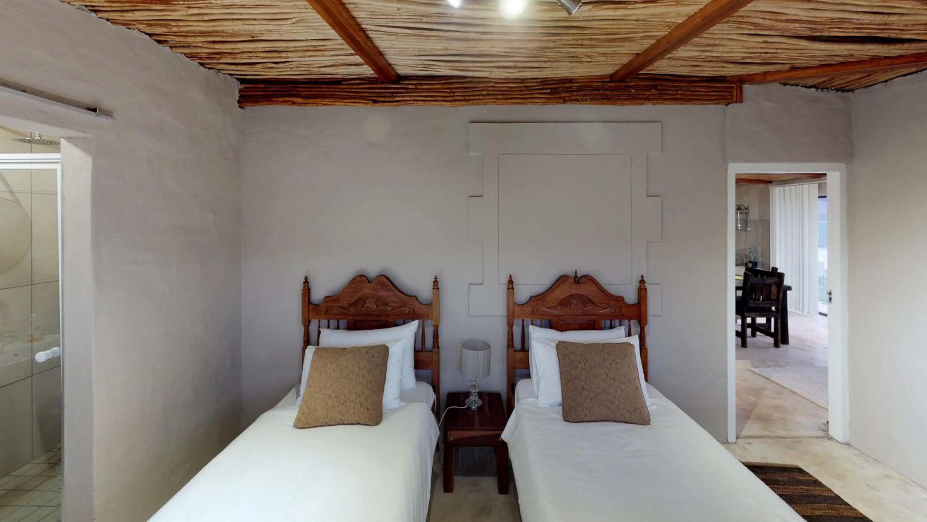 Bedroom, Bed in Swartberg Pass Cottages - Kobus Se Gat