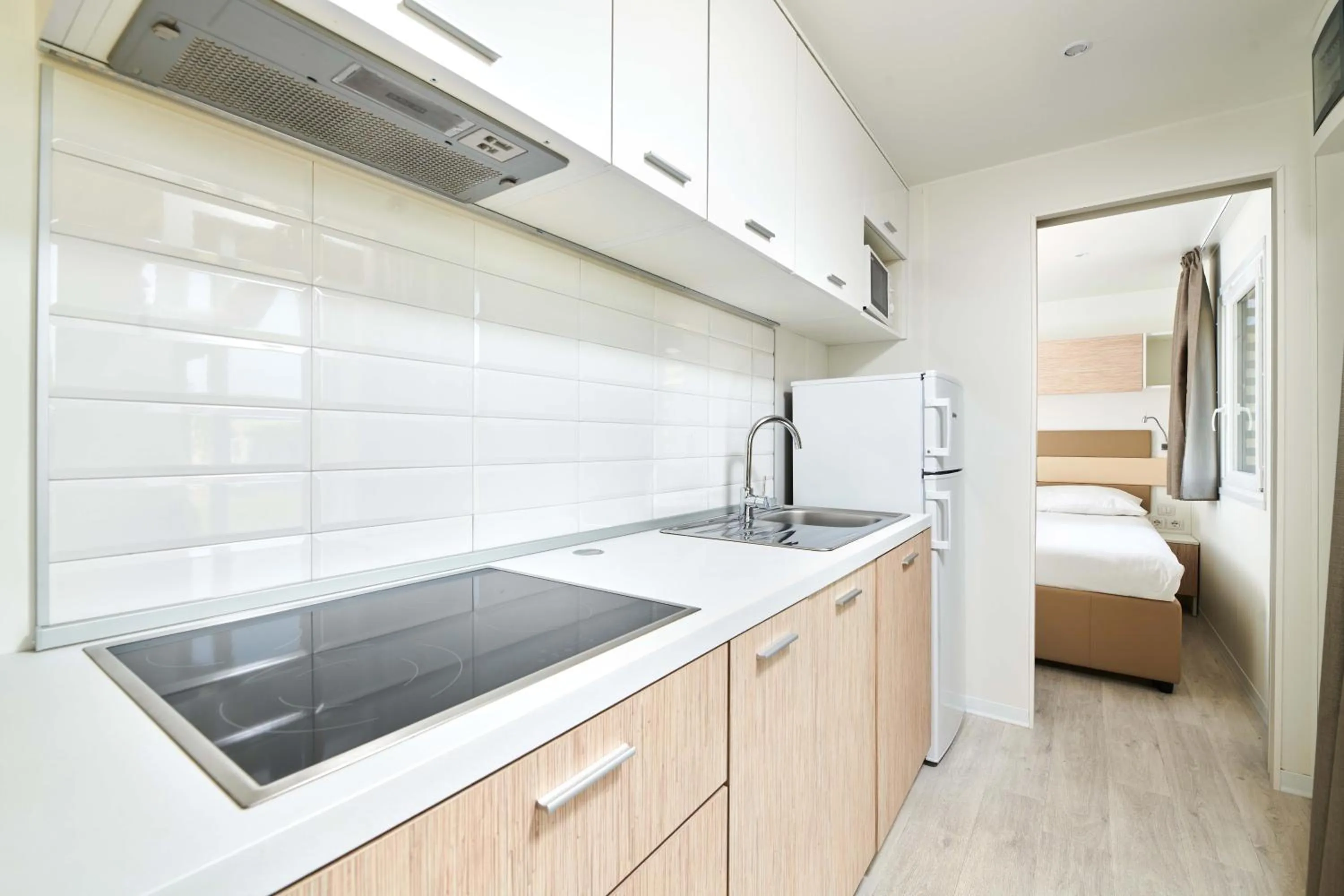 Kitchen or kitchenette, Bed in Camping Stella Maris Mobile Homes