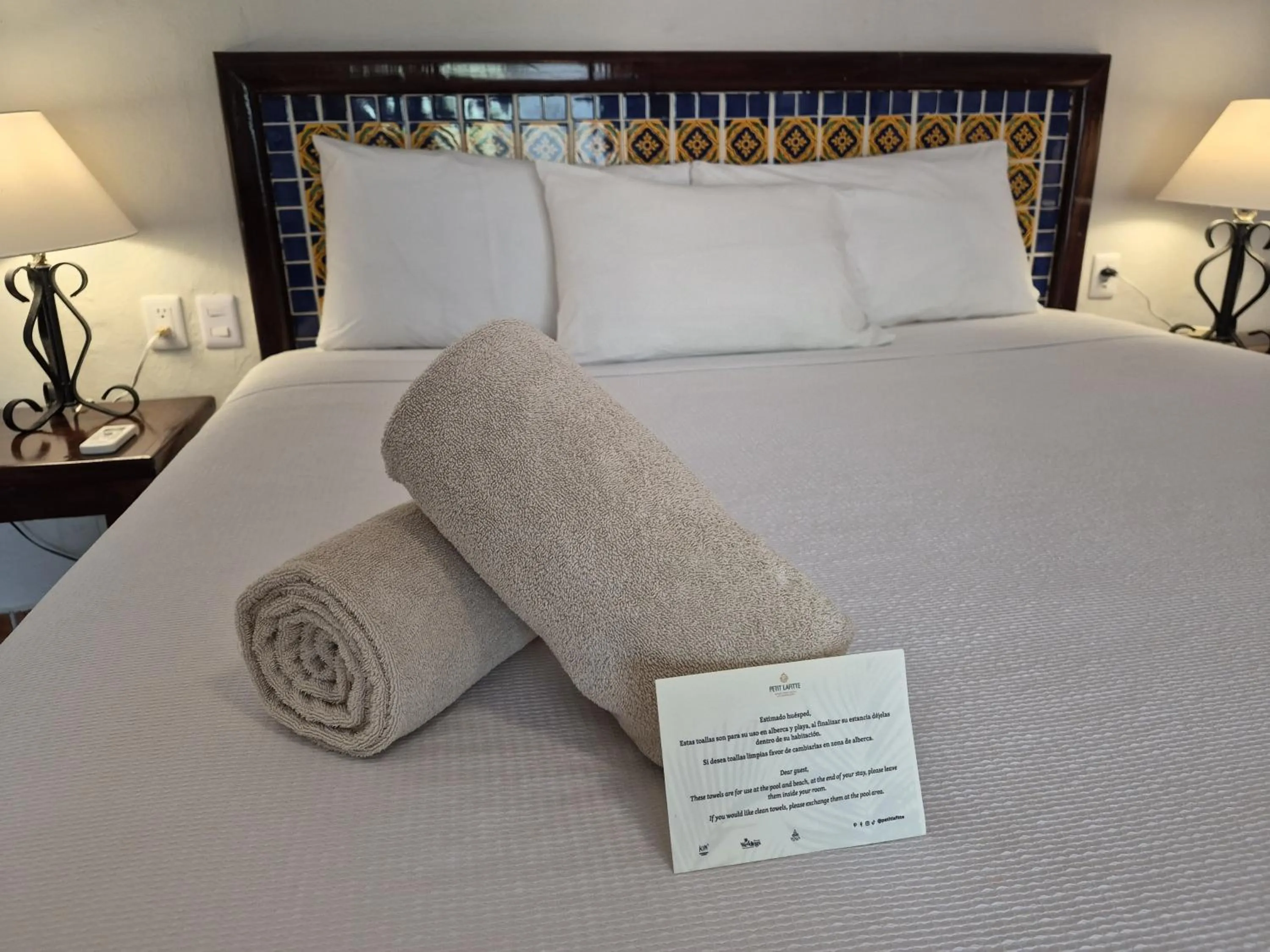 Bed in Petit Lafitte Beach Front Hotel & Bungalows