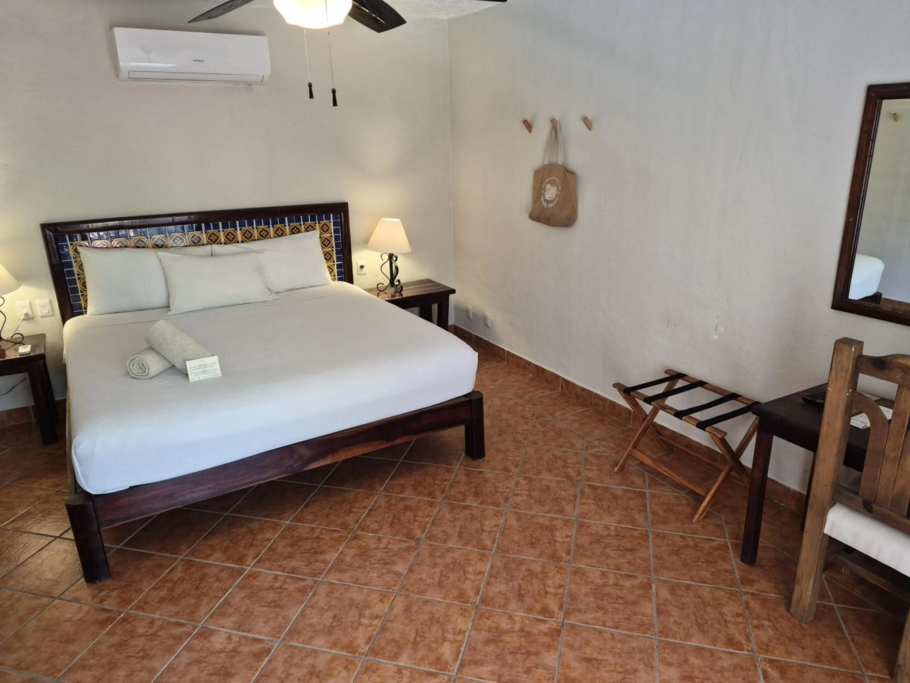 Bed in Petit Lafitte Beach Front Hotel & Bungalows