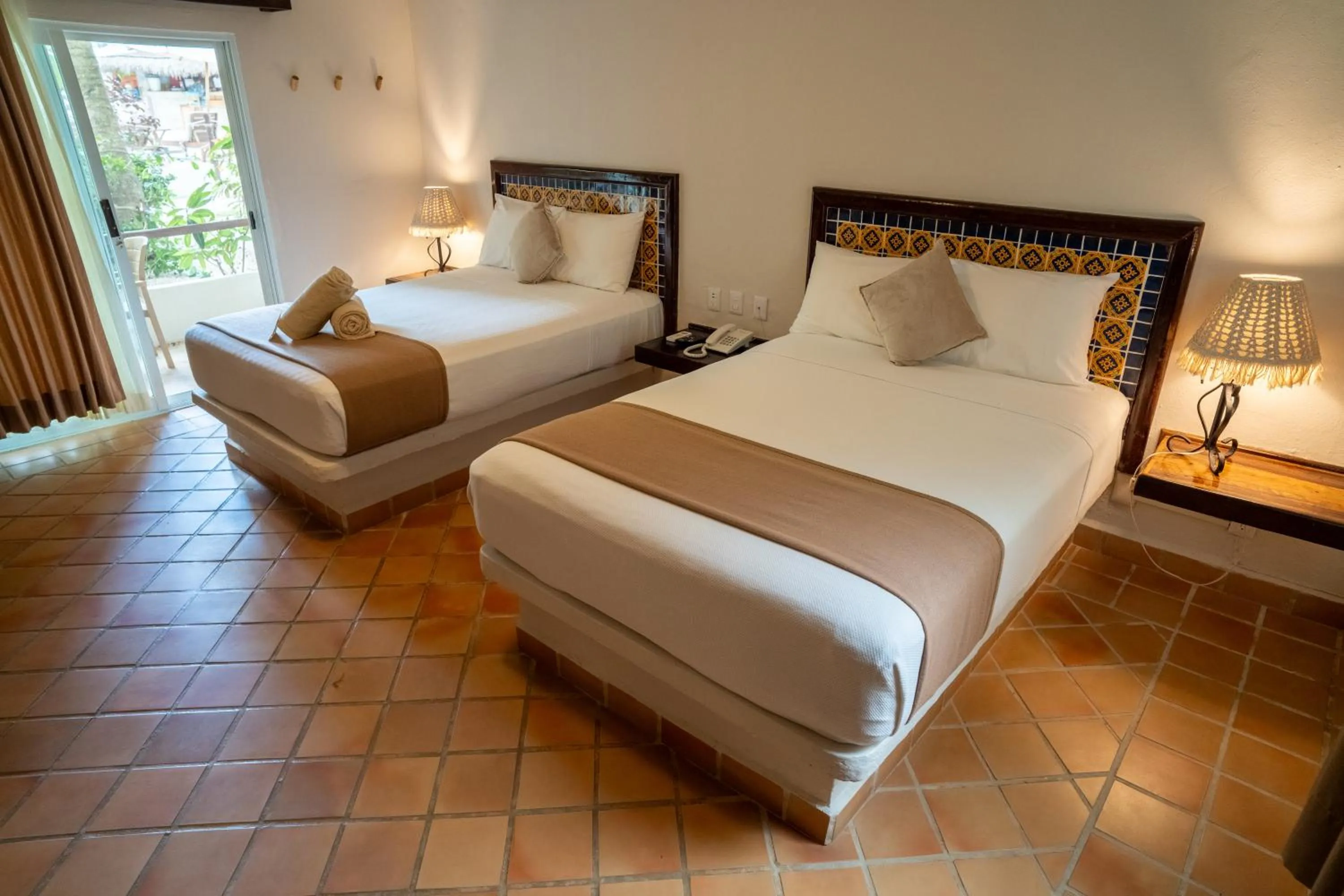 Photo of the whole room, Bed in Petit Lafitte Beach Front Hotel & Bungalows