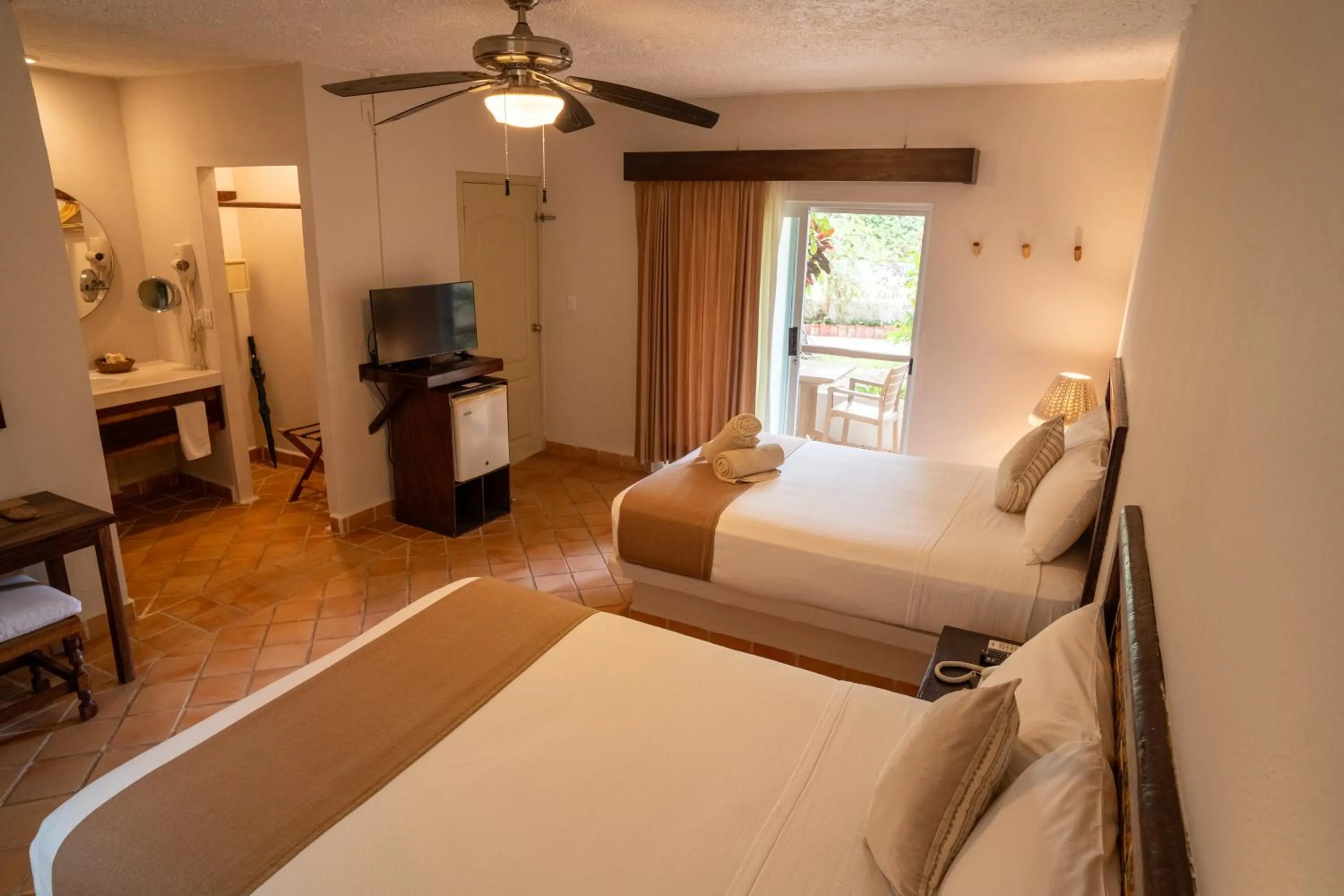 Photo of the whole room, Bed in Petit Lafitte Beach Front Hotel & Bungalows