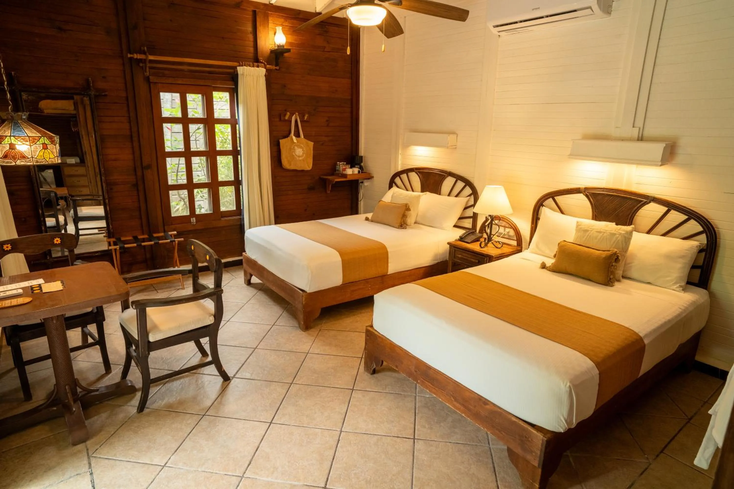 Photo of the whole room, Bed in Petit Lafitte Beach Front Hotel & Bungalows