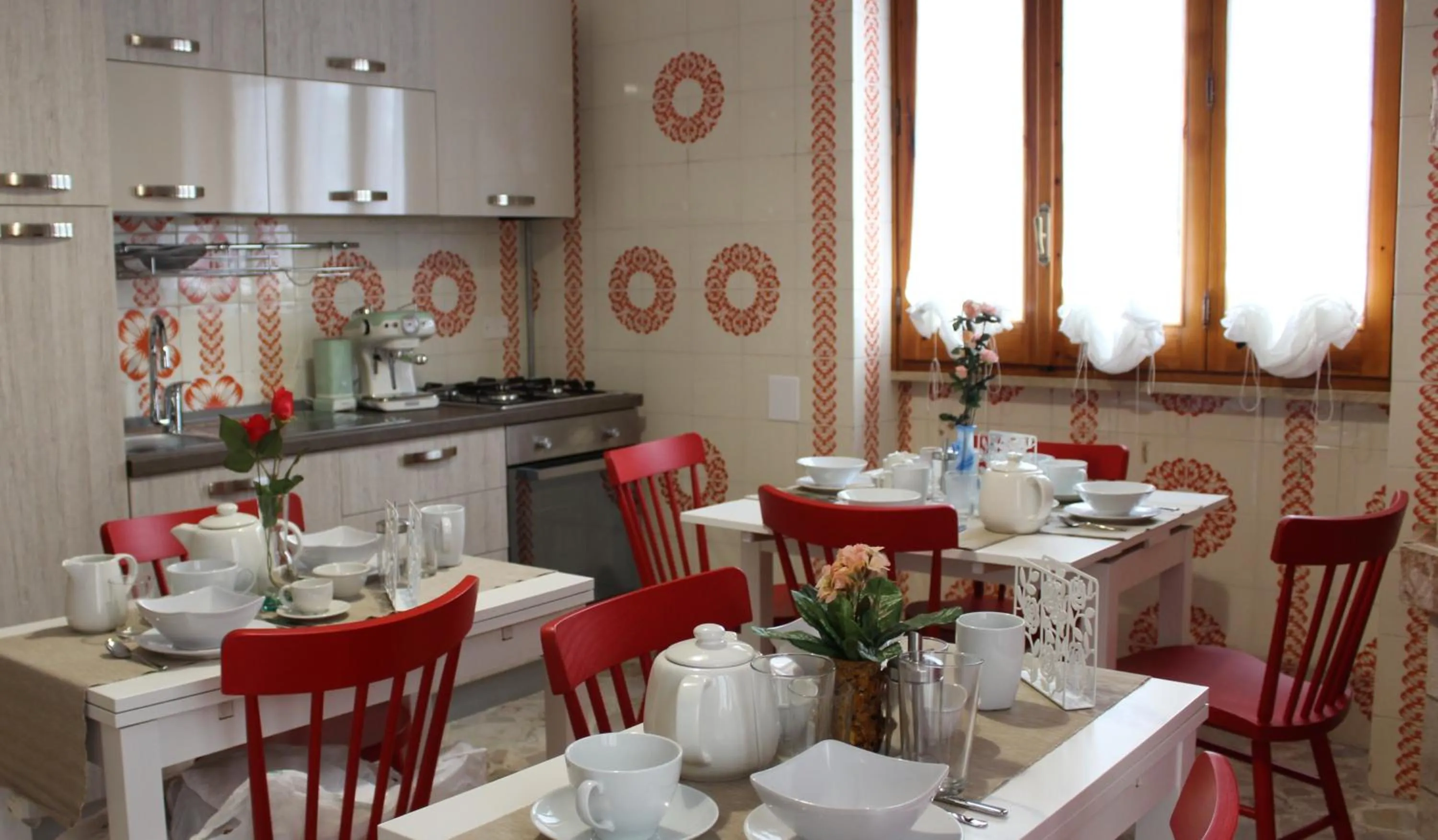 Communal lounge/ TV room in La Chiave Rossa B&B