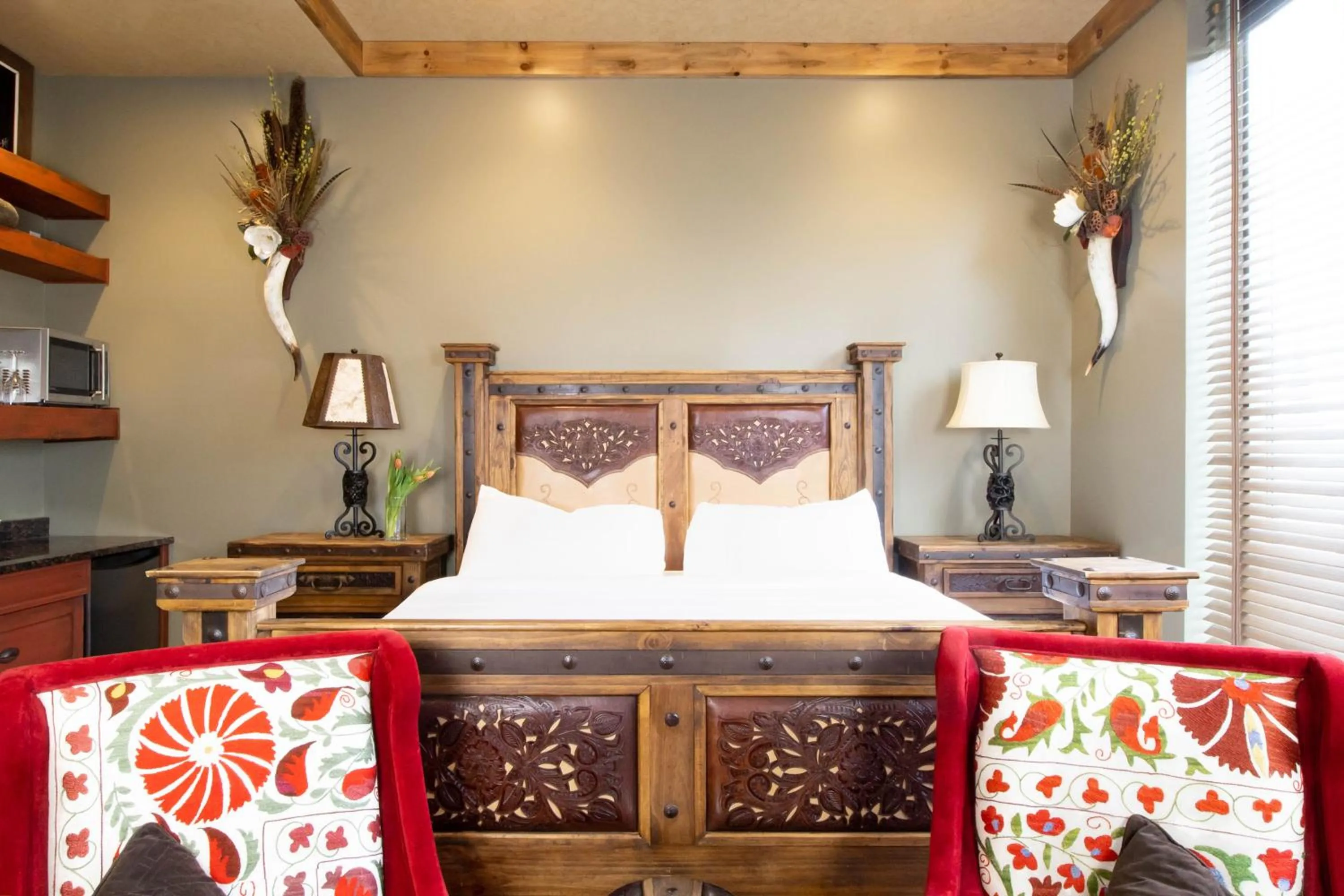 Bed in Retro Suites Hotel