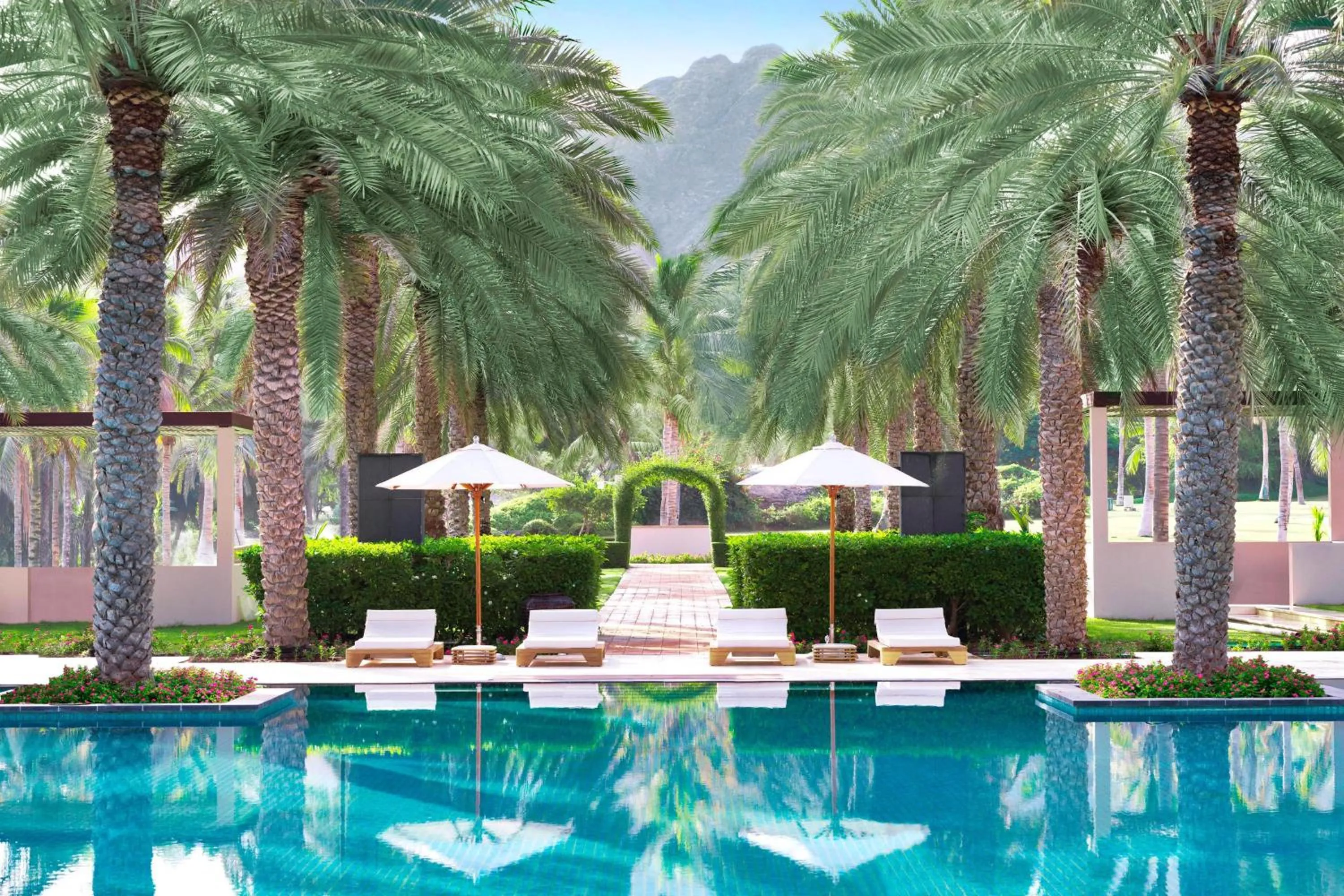 Swimming pool in Al Bustan Palace, a Ritz-Carlton Hotel