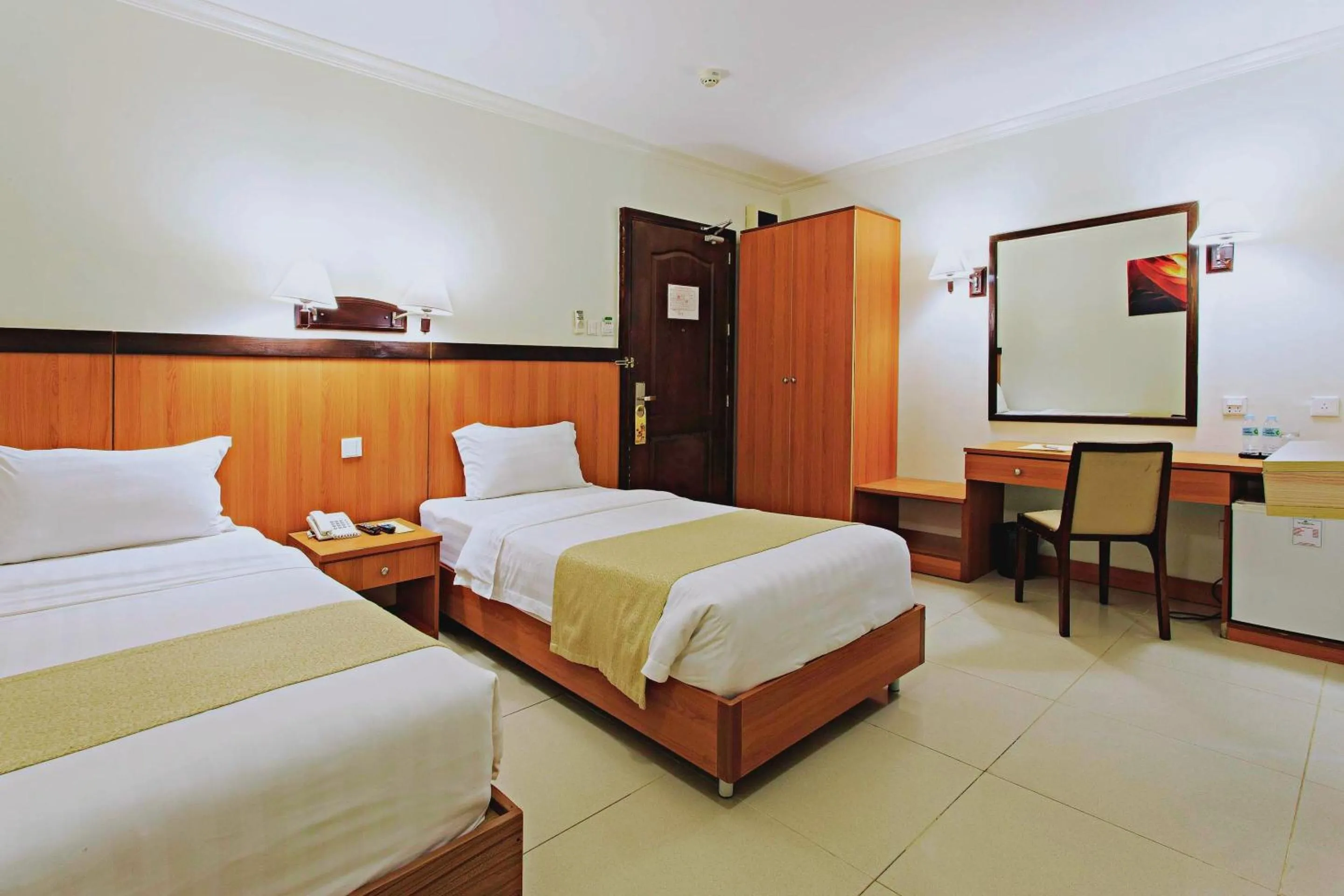 Bed in The Orchard Cebu Hotel & Suites powered by Cocotel