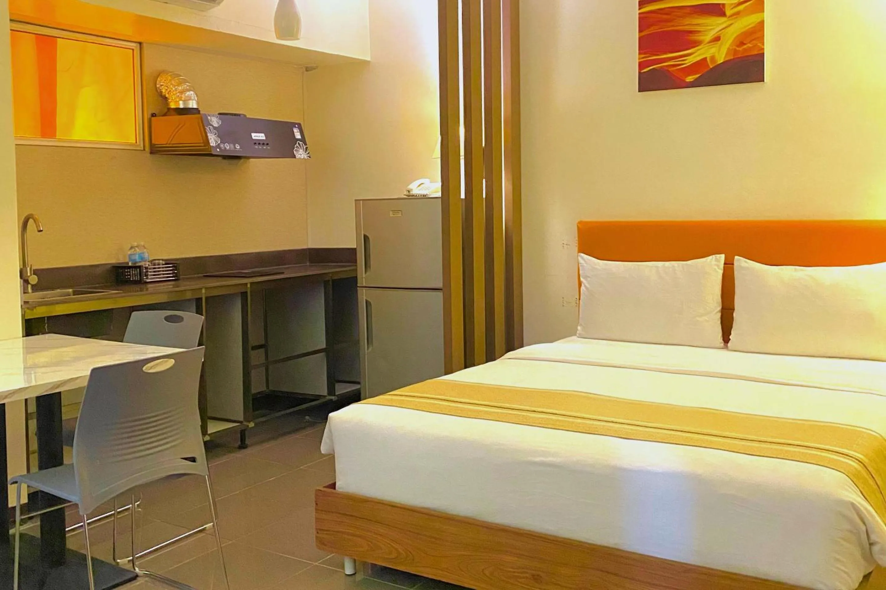 Bed in The Orchard Cebu Hotel & Suites powered by Cocotel