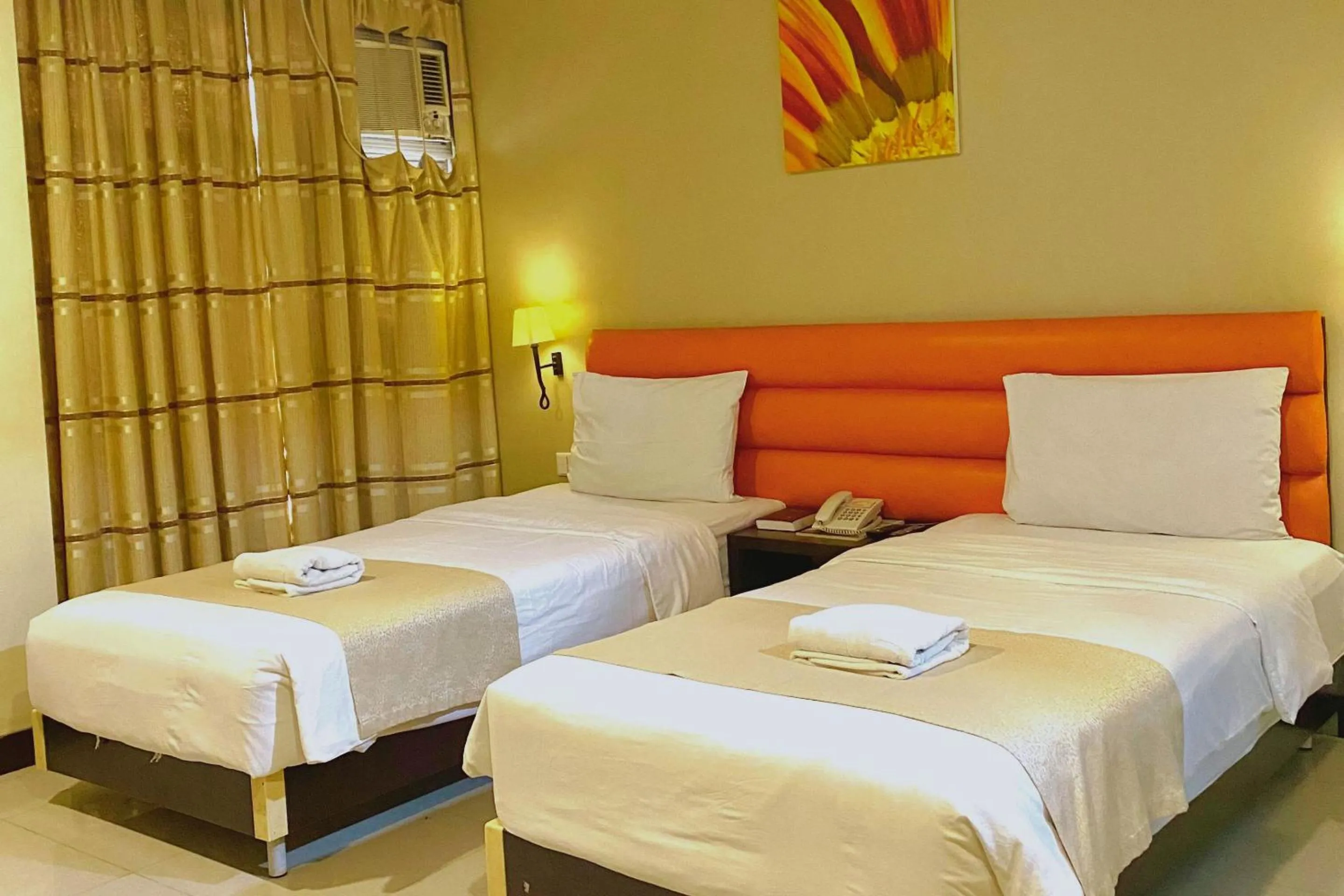 Bed in The Orchard Cebu Hotel & Suites powered by Cocotel