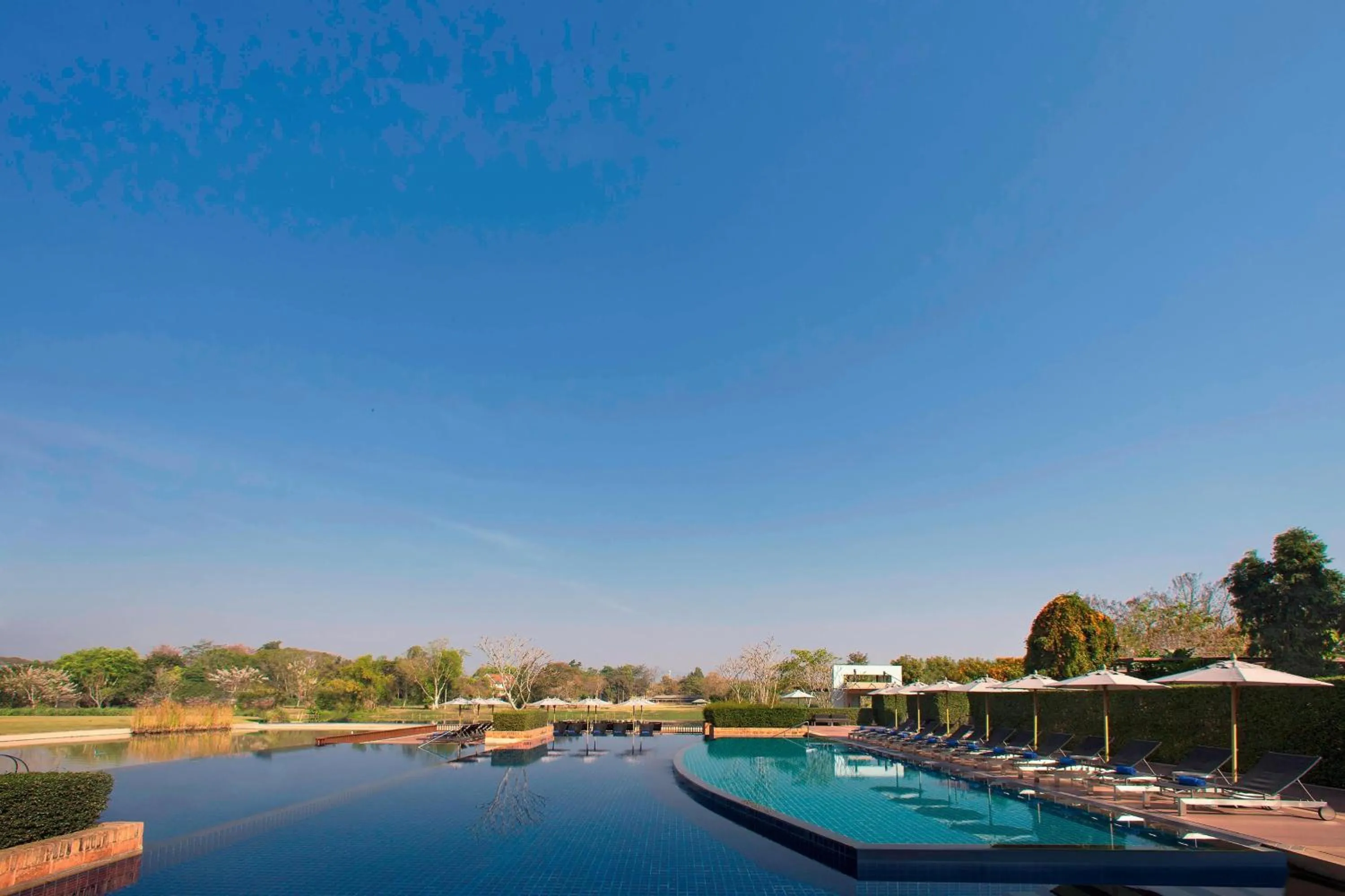 Swimming pool in Le Meridien Chiang Rai Resort, Thailand