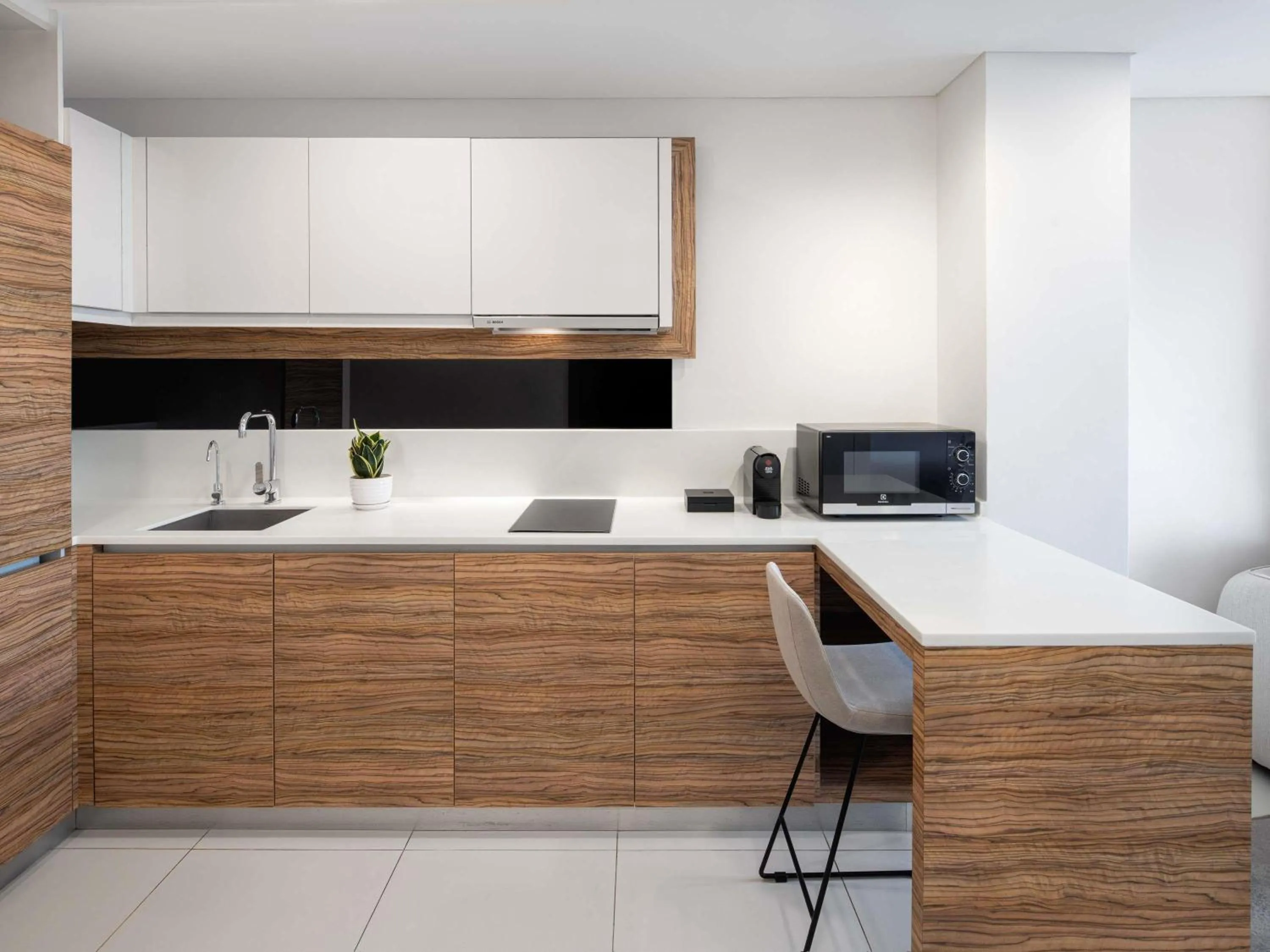 Bedroom in Novotel Living Singapore Orchard