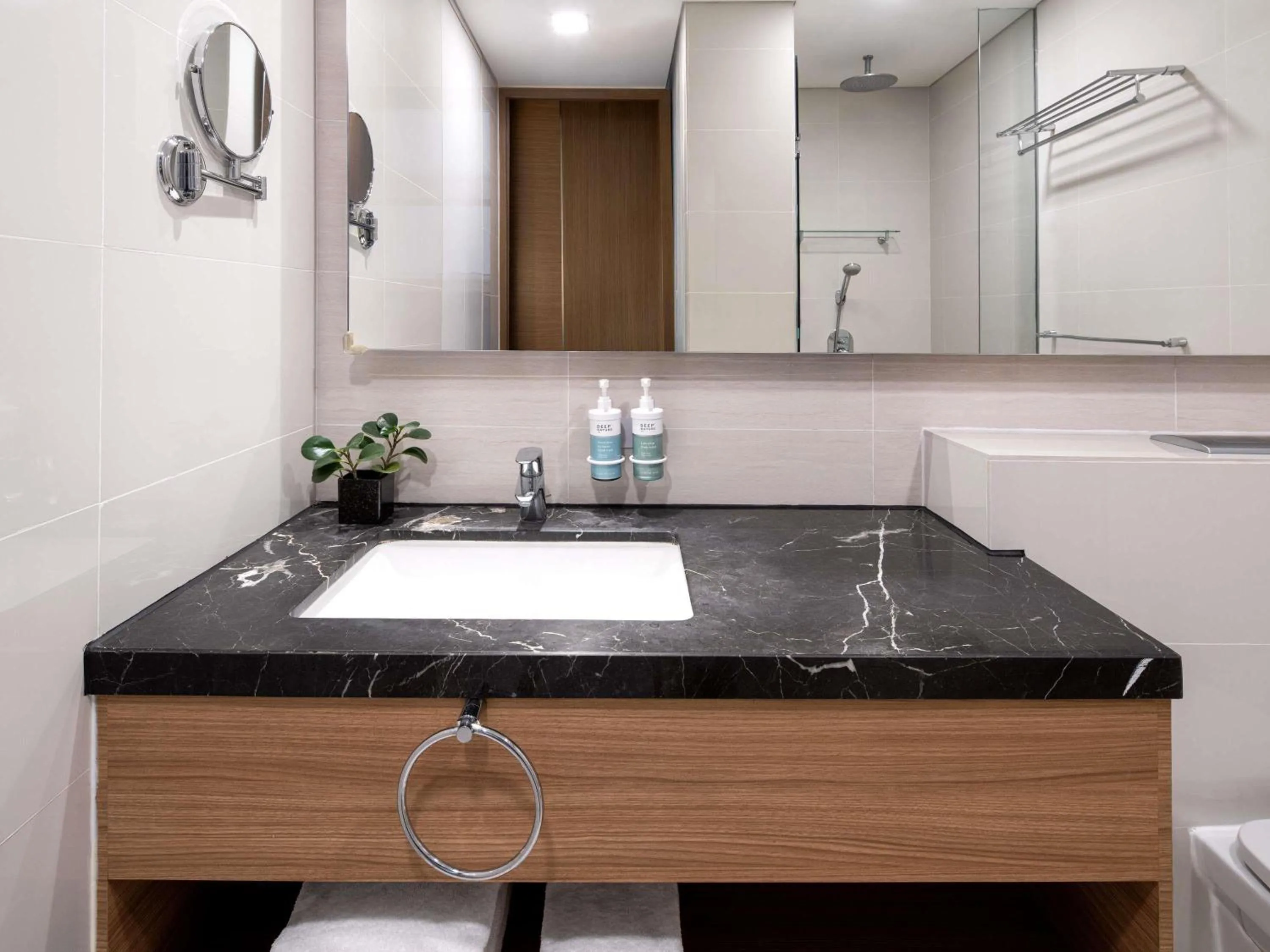 Bedroom in Novotel Living Singapore Orchard