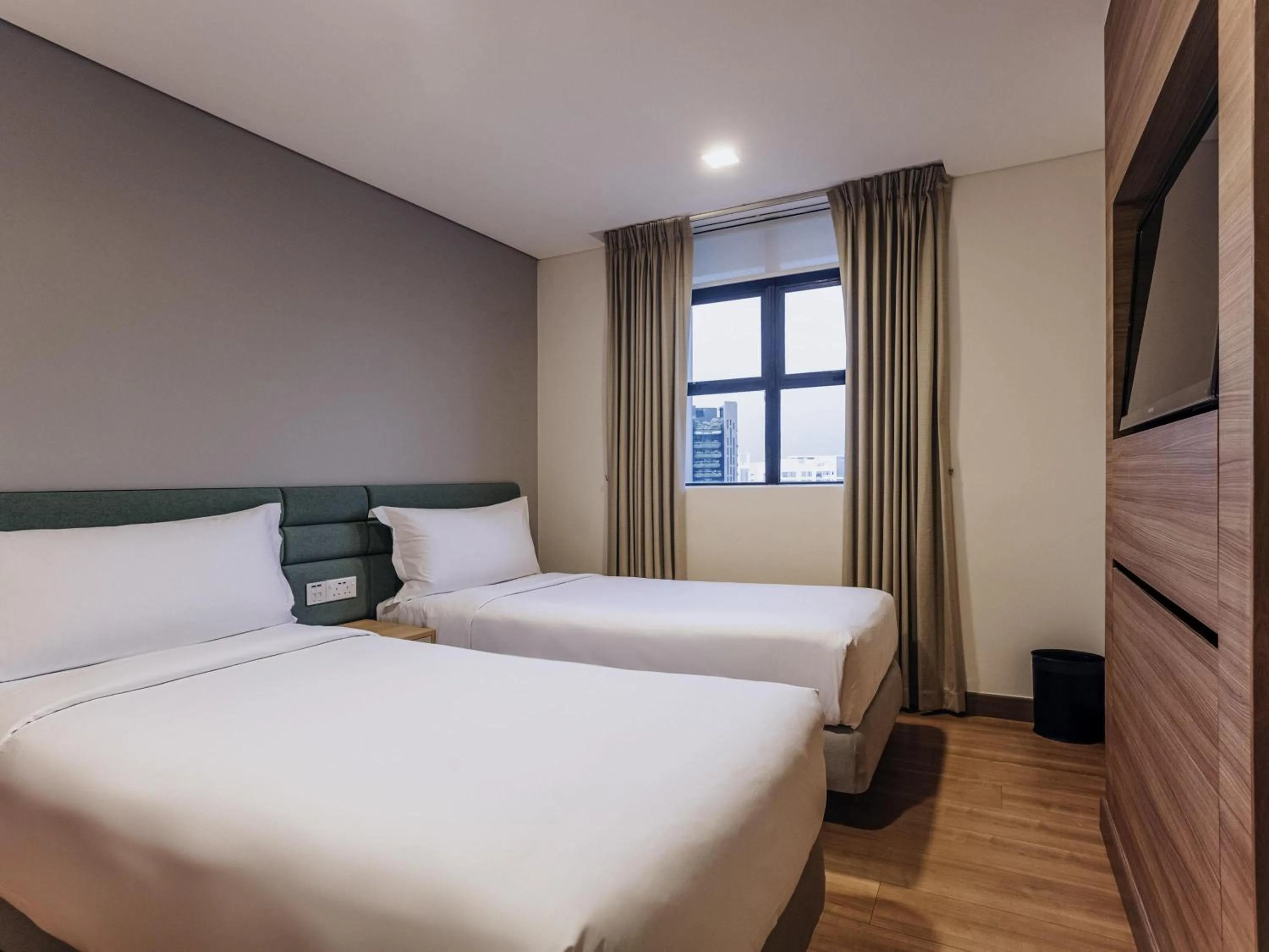 Bedroom, Bed in Novotel Living Singapore Orchard