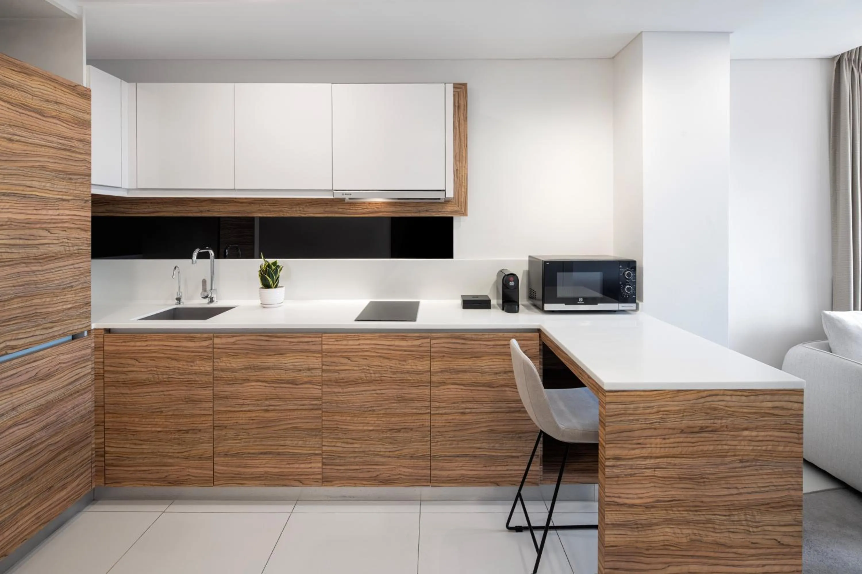 Kitchen or kitchenette in Novotel Living Singapore Orchard