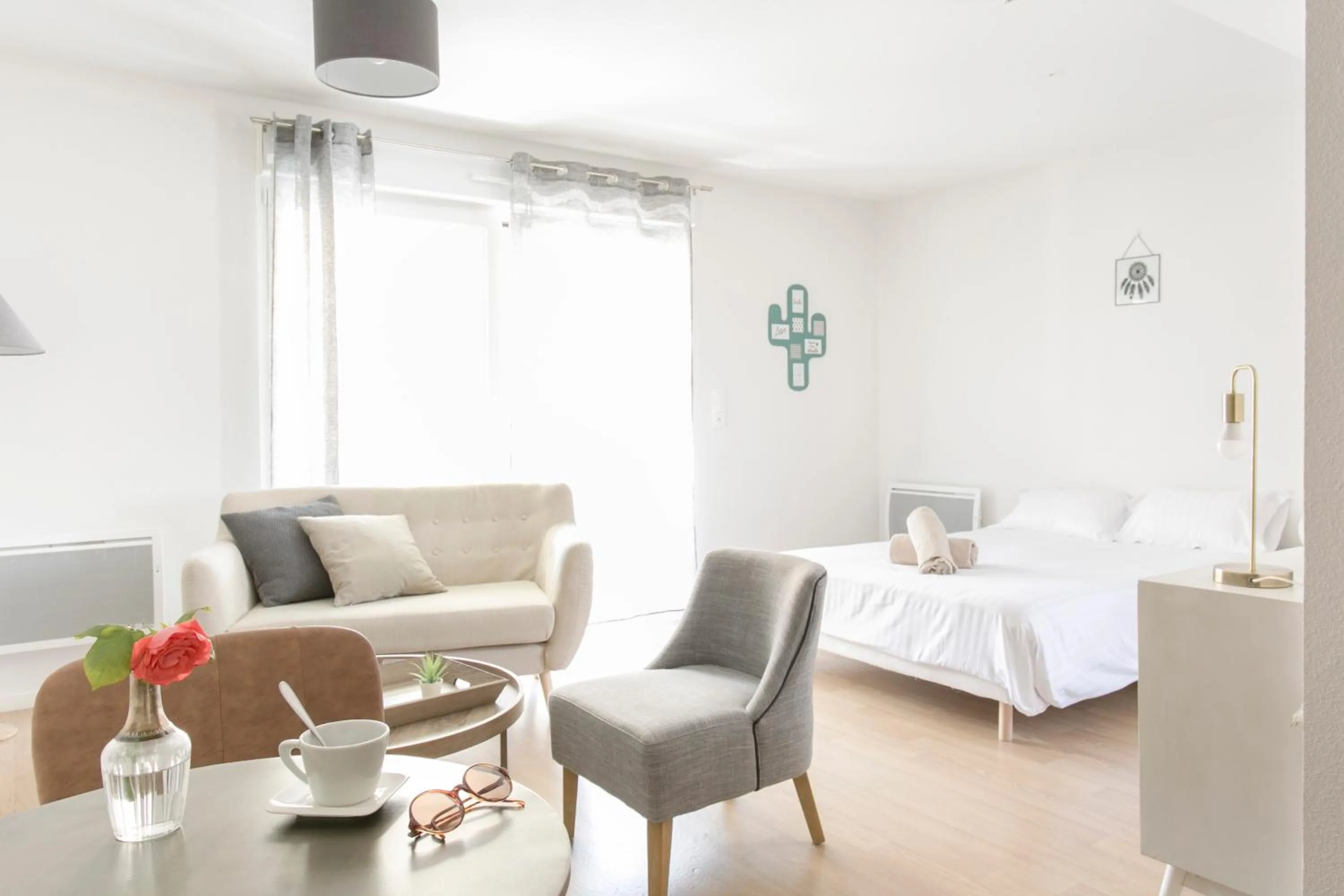 Living room, Bed in Zenao Appart'hôtels Mulhouse