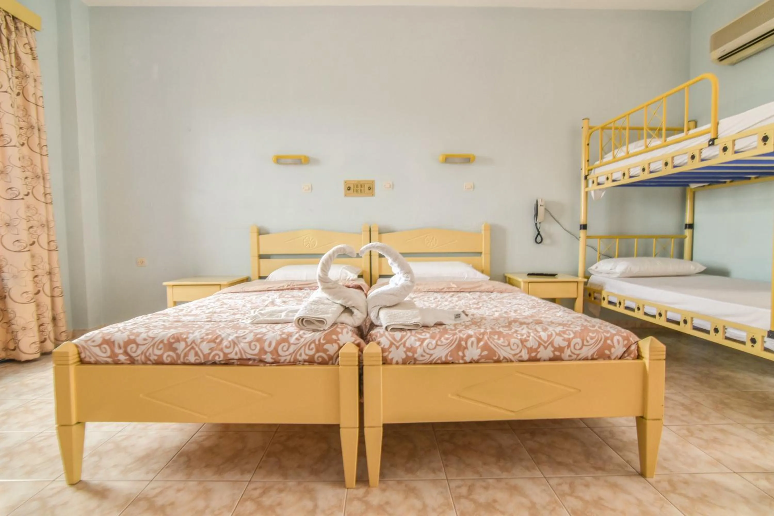 Bed in Vardes Hotel Studios