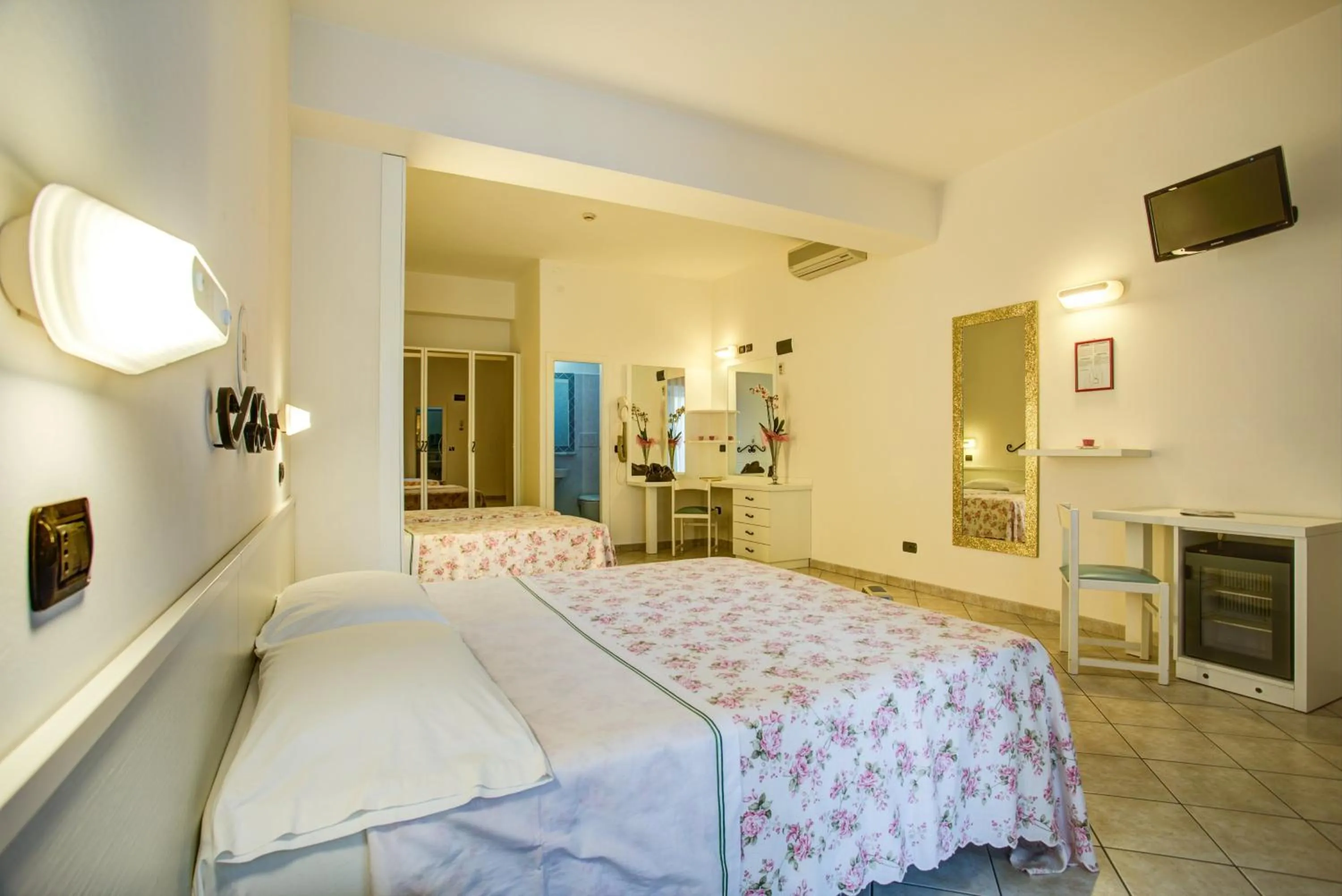 Bed in Ancora Hotel & Residence