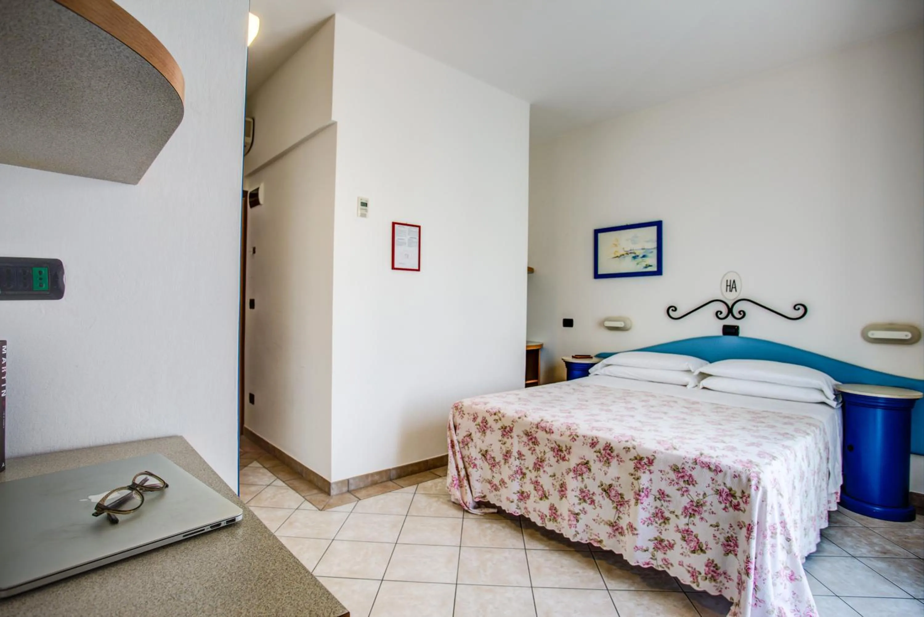 Bed in Ancora Hotel & Residence