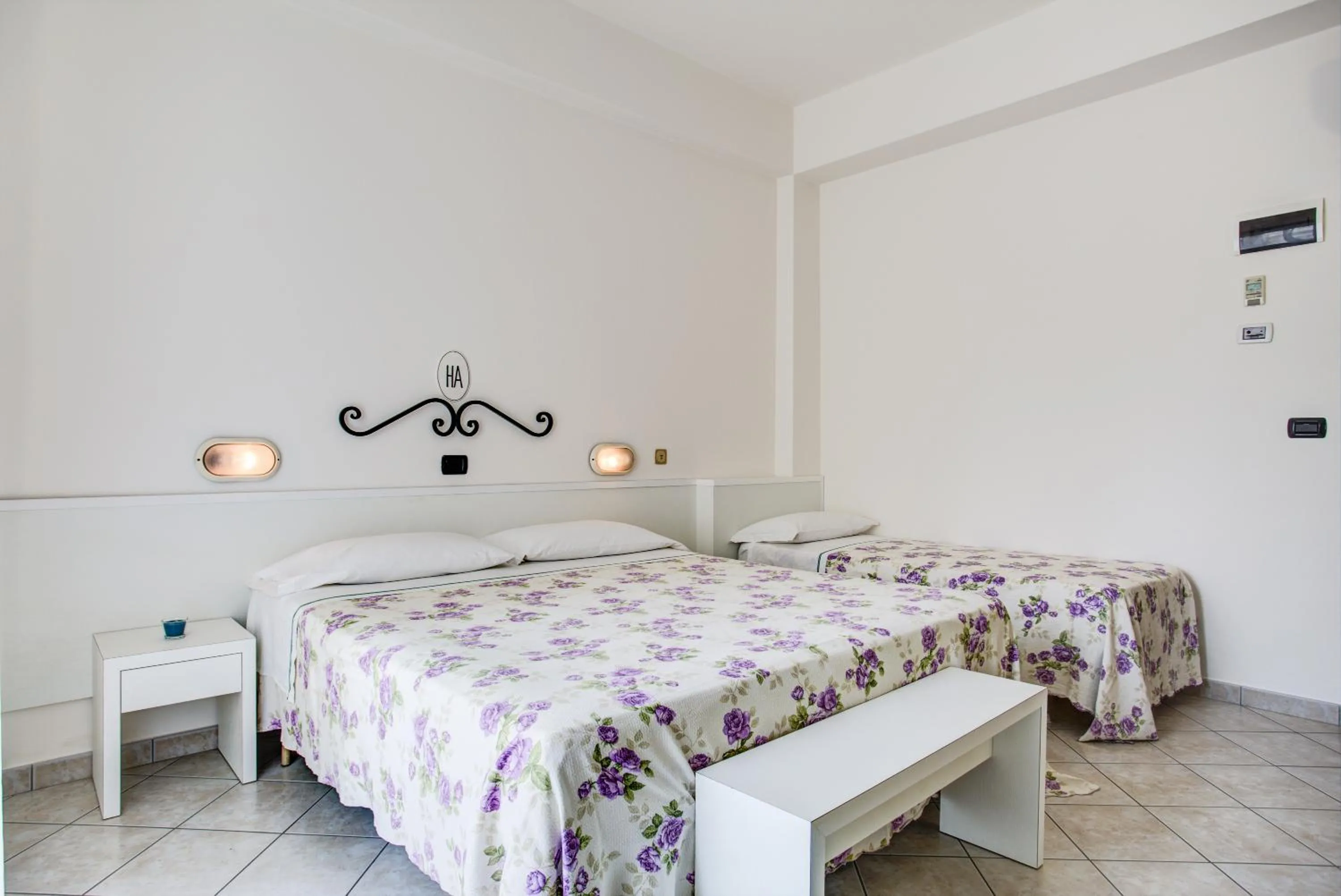 Bed in Ancora Hotel & Residence