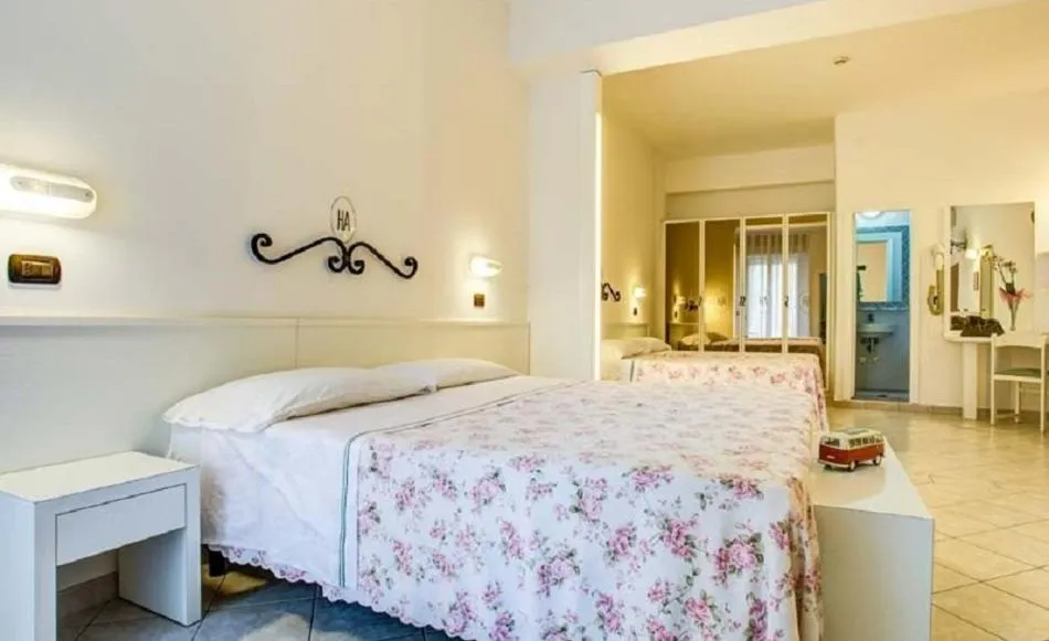 Bed in Ancora Hotel & Residence