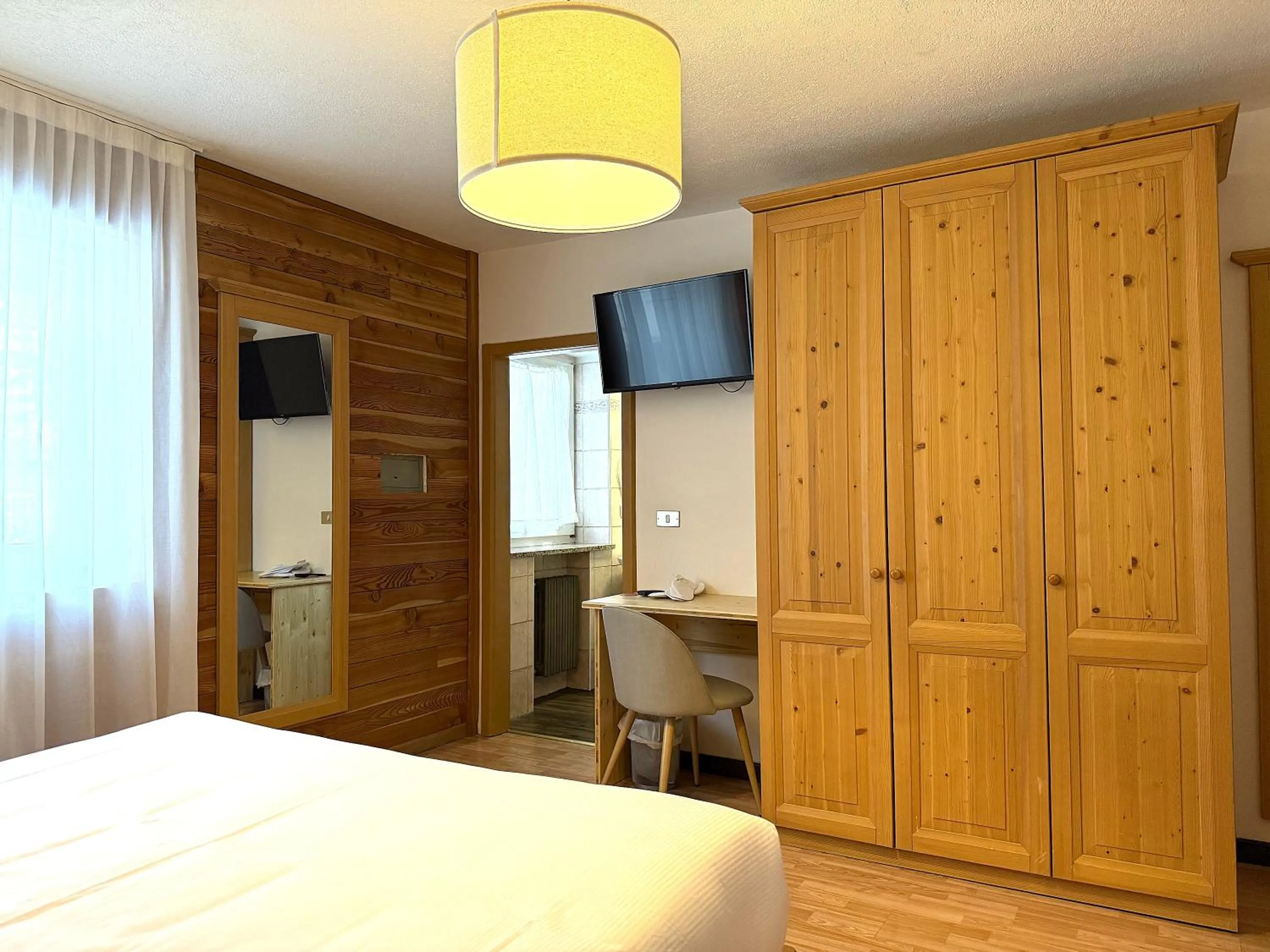 Bed in Hotel Rododendro Val di Fassa