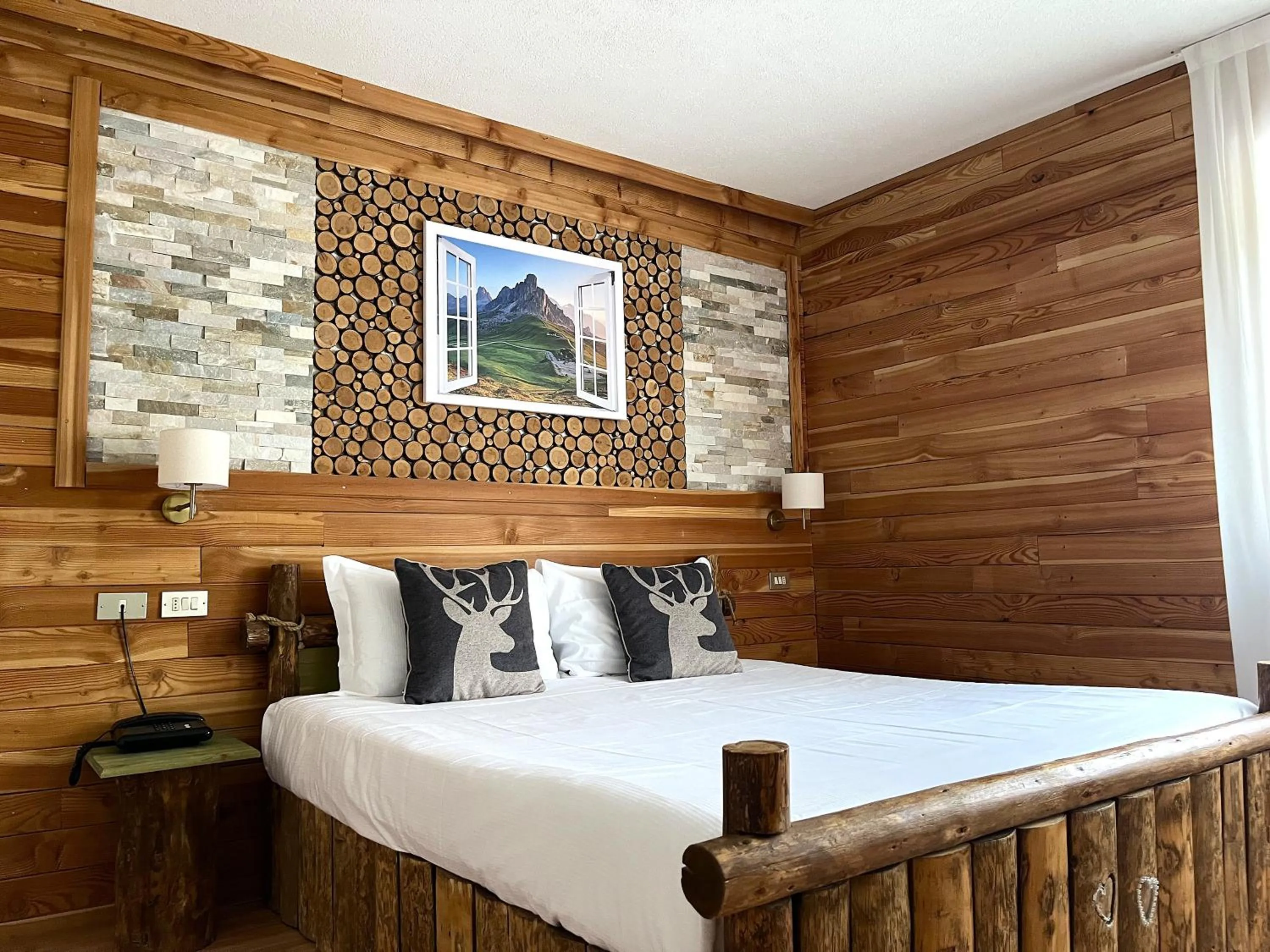 Bed in Hotel Rododendro Val di Fassa