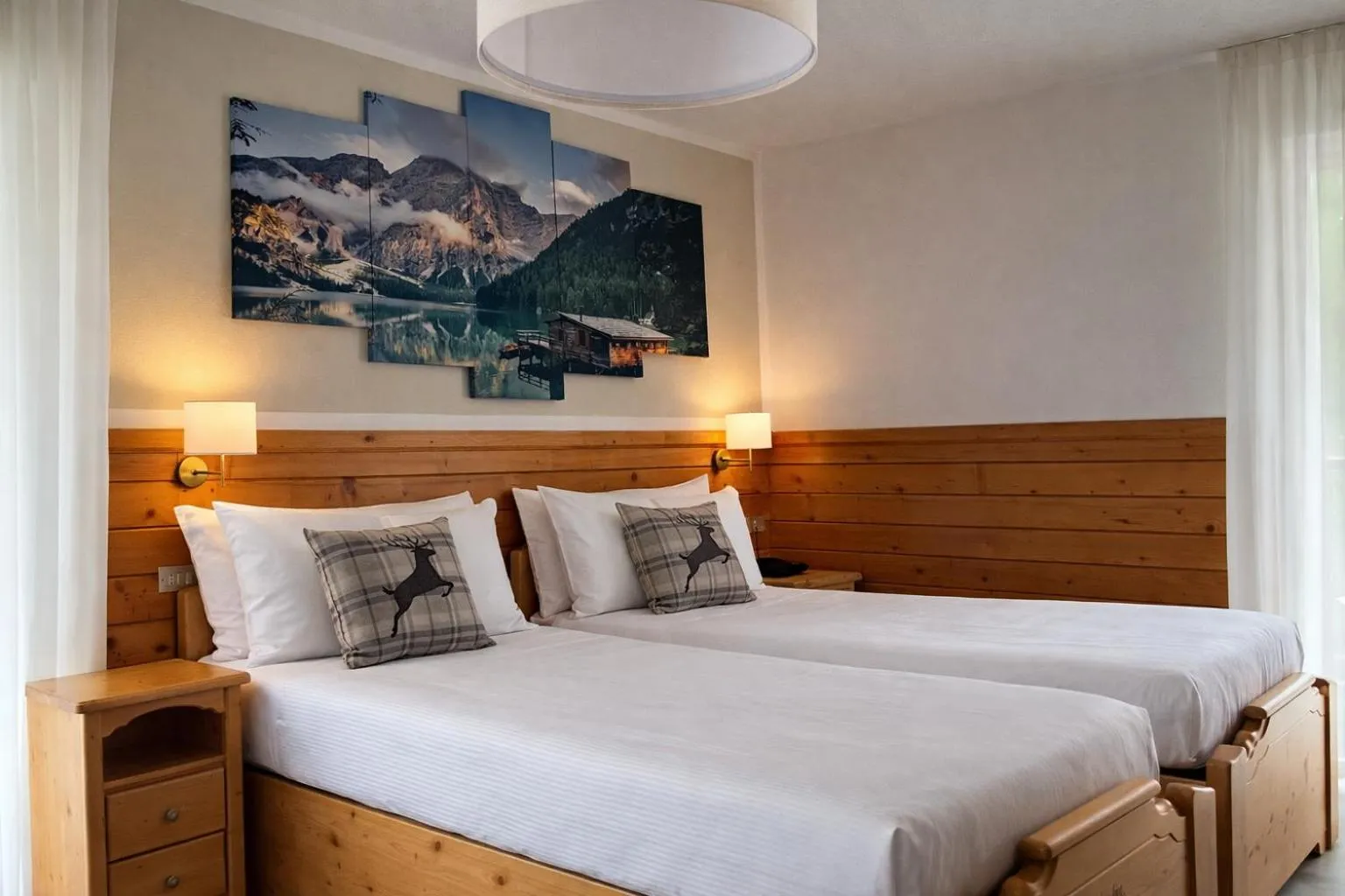 Bed in Hotel Rododendro Val di Fassa