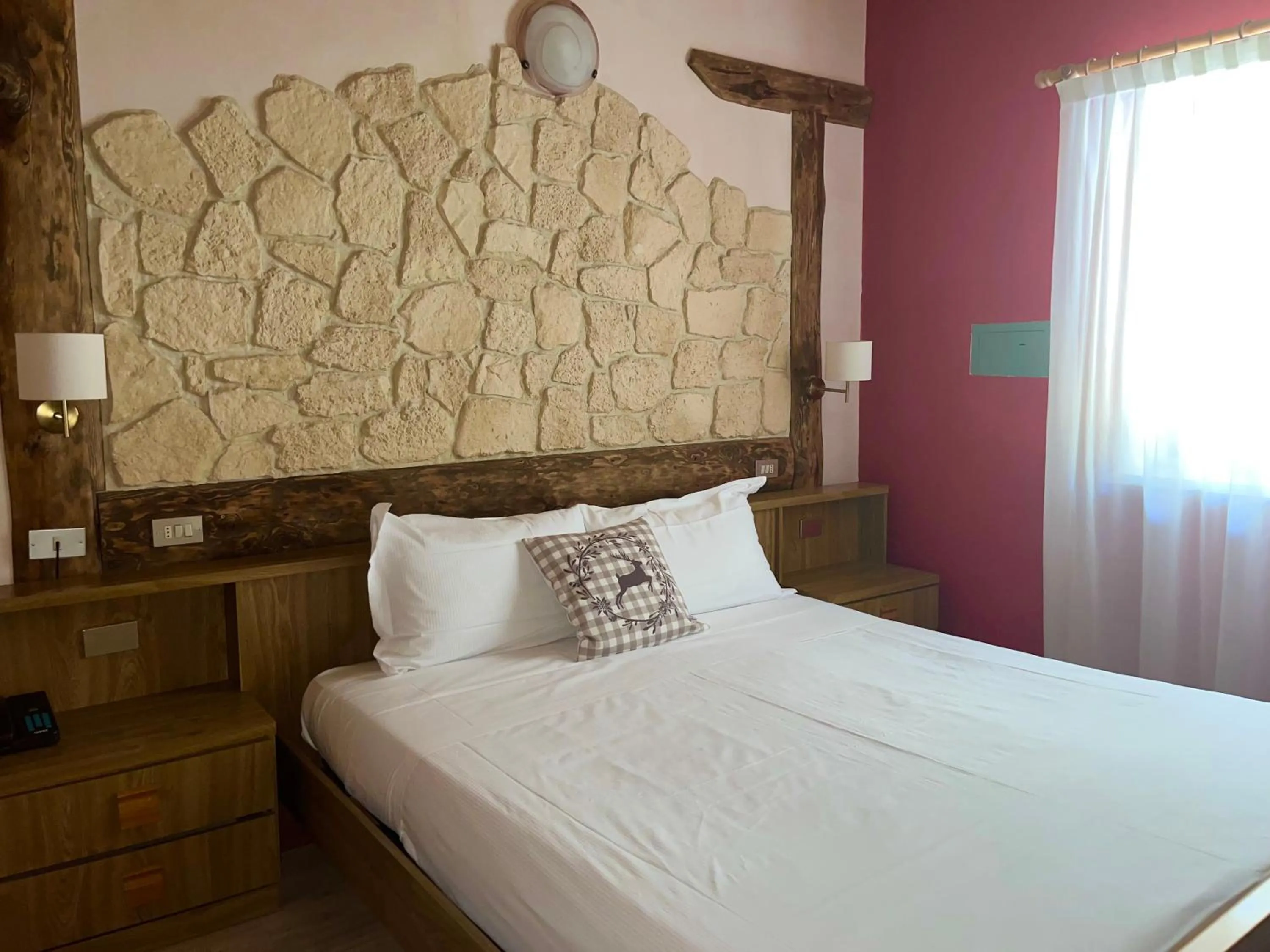 Bed in Hotel Rododendro Val di Fassa