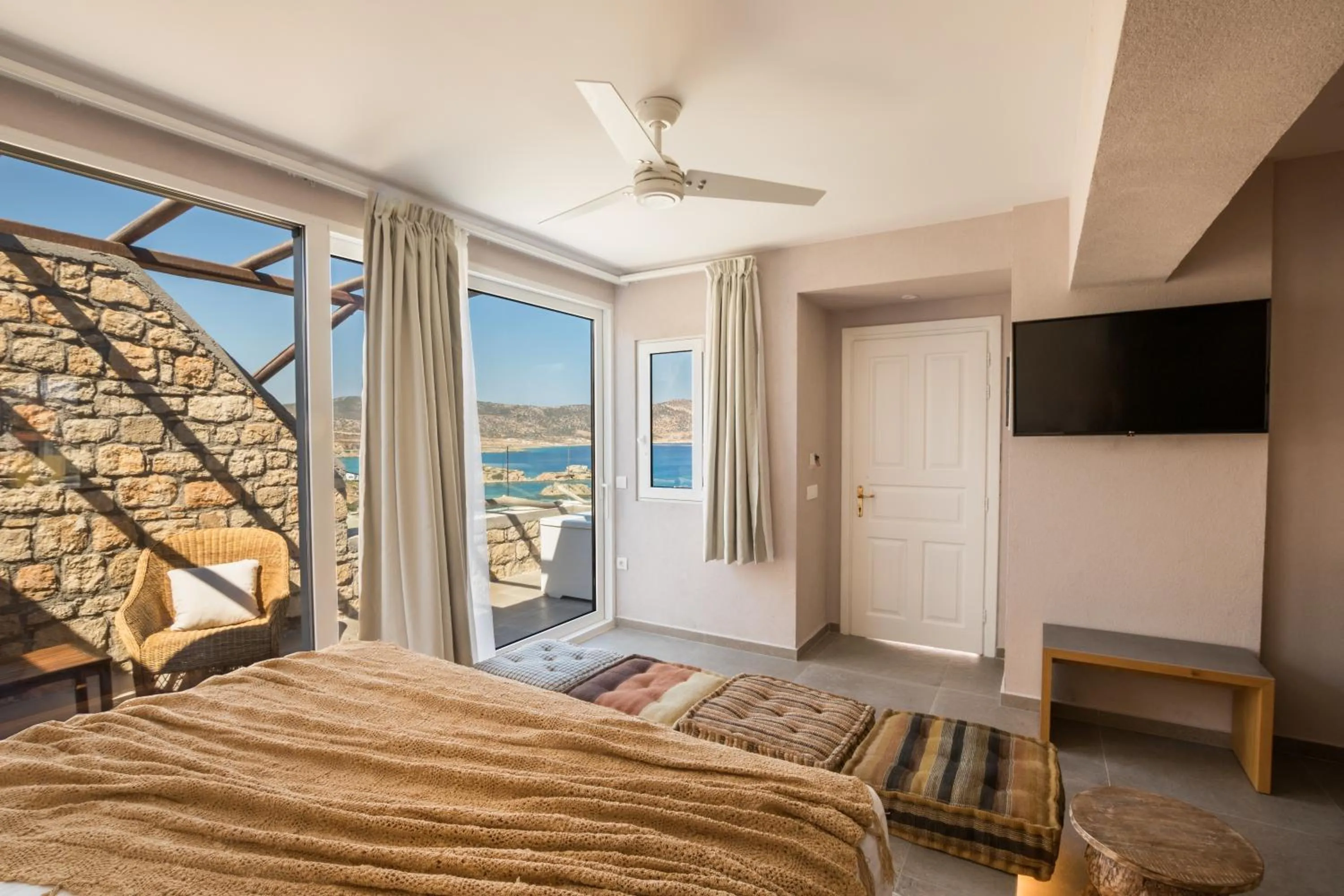 Bed in Aegean Village Beachfront Resort