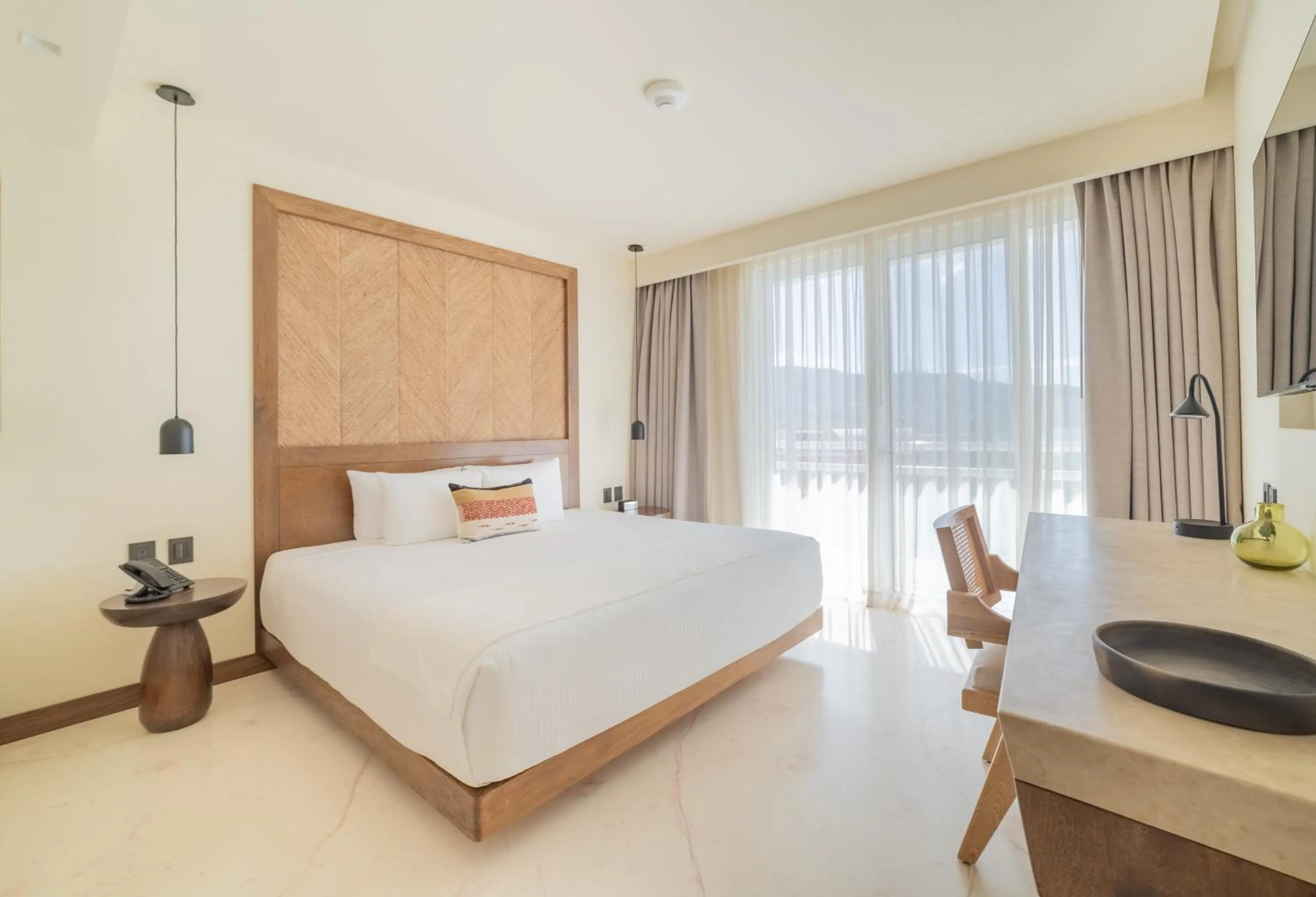 Photo of the whole room, Bed in Hotel Indigo La Paz Puerta Cortes by IHG