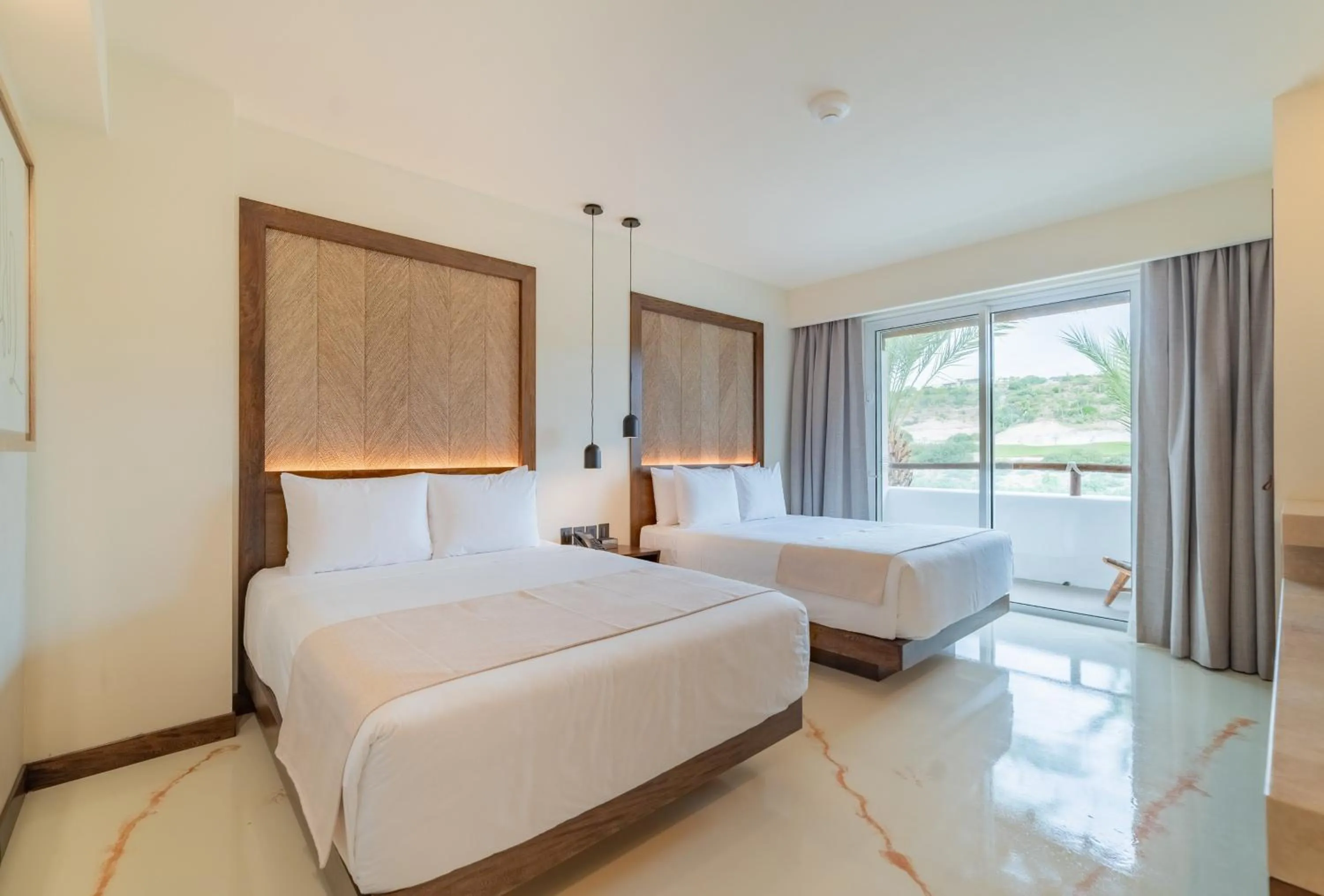 Photo of the whole room, Bed in Hotel Indigo La Paz Puerta Cortes by IHG