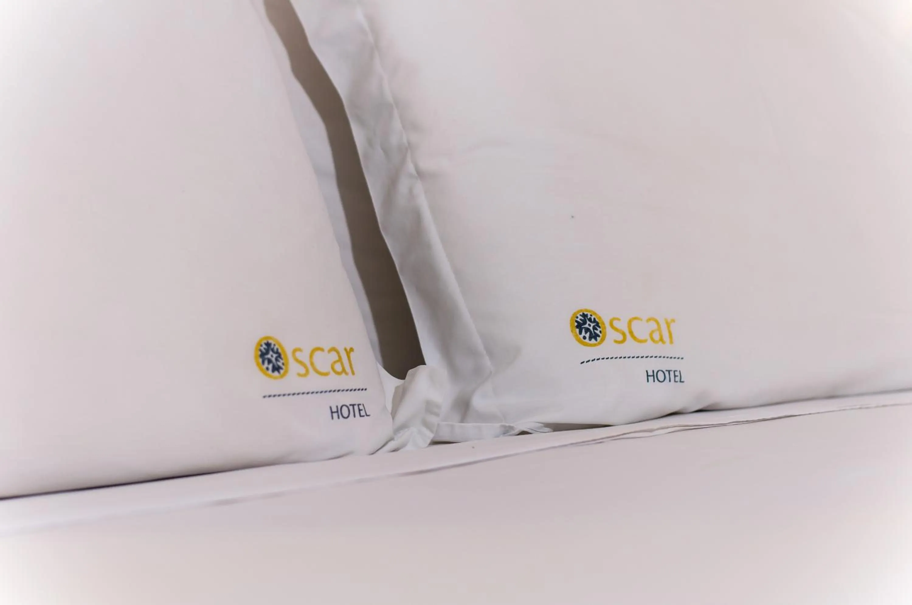 Bed in Oscar Hotel Executive