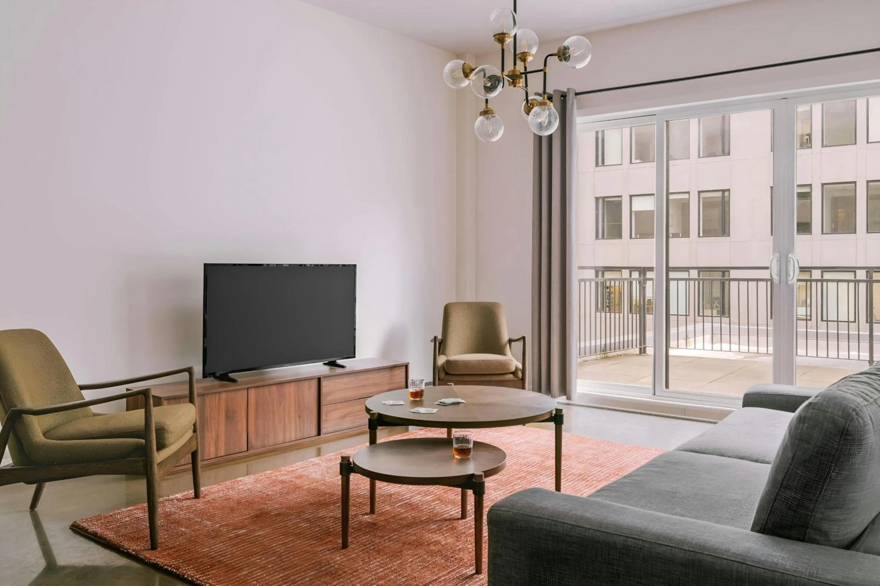 Living room in Sonder by Marriott Bonvoy Penny Lane Apartments Old Montreal