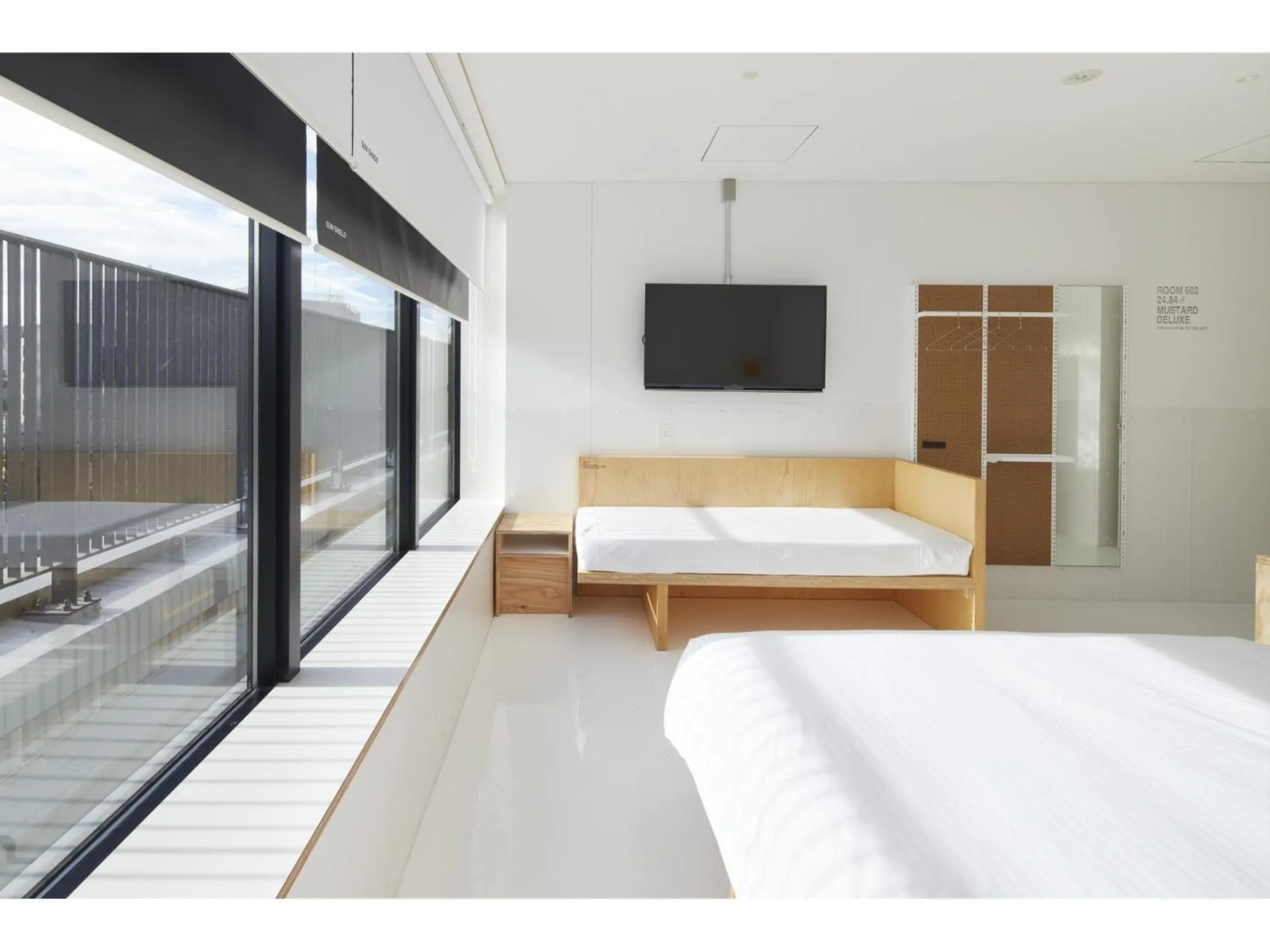 Bed, TV/Entertainment Center in Mustard Hotel Shibuya