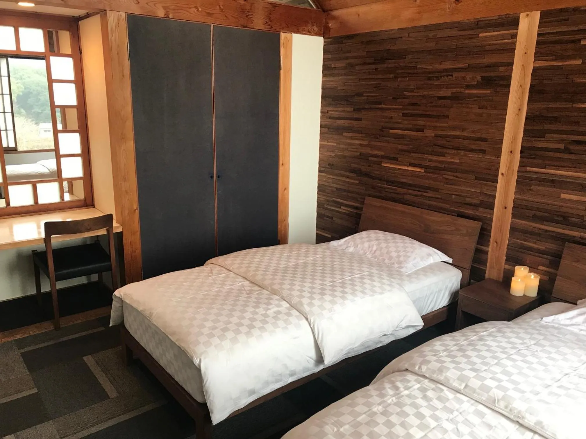 Bed in Shiraishi Island International Villa