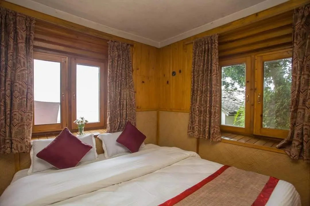 Bed in Everest Manla Resort