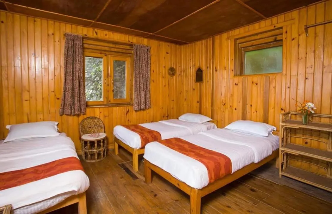 Bed in Everest Manla Resort