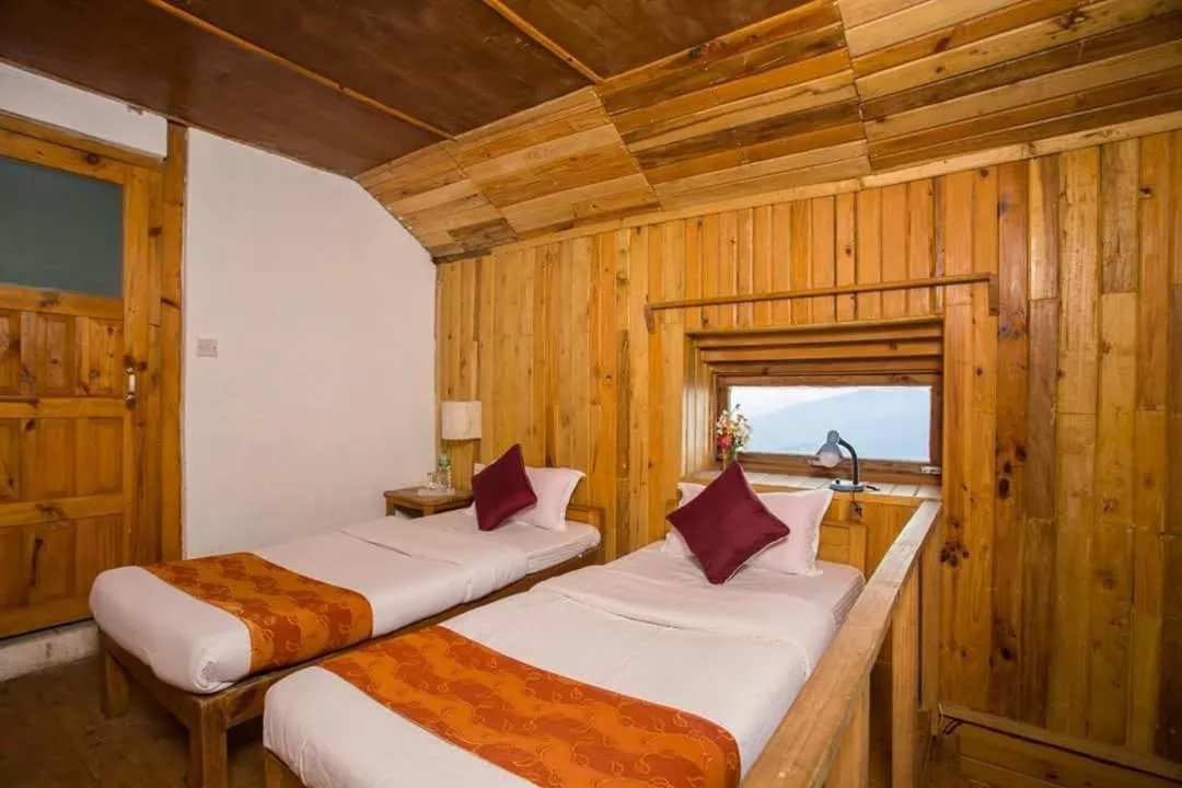 Bed in Everest Manla Resort