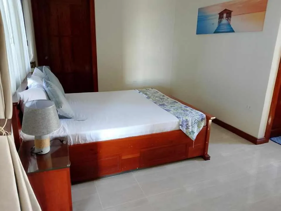 Bed in Ocean Breeze Resort