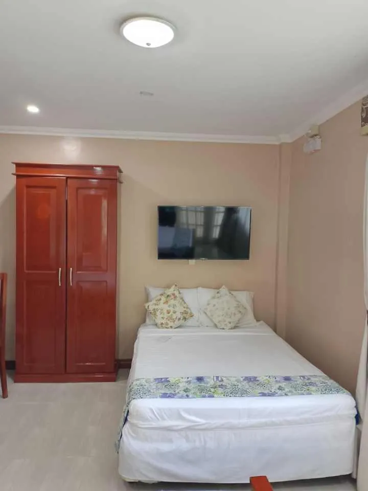 Bed in Ocean Breeze Resort