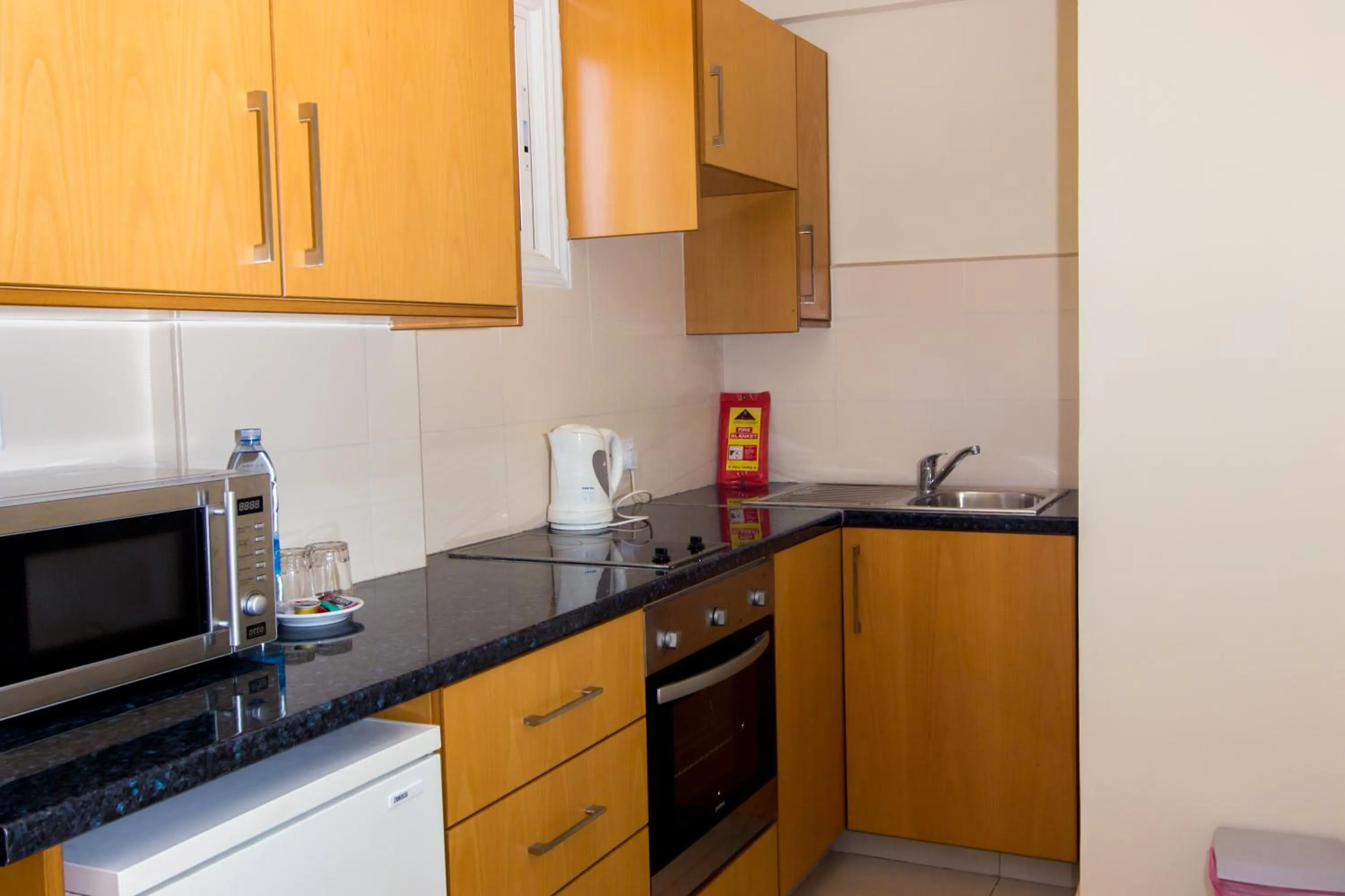 Kitchen or kitchenette in Kama Lifestyle Apartments