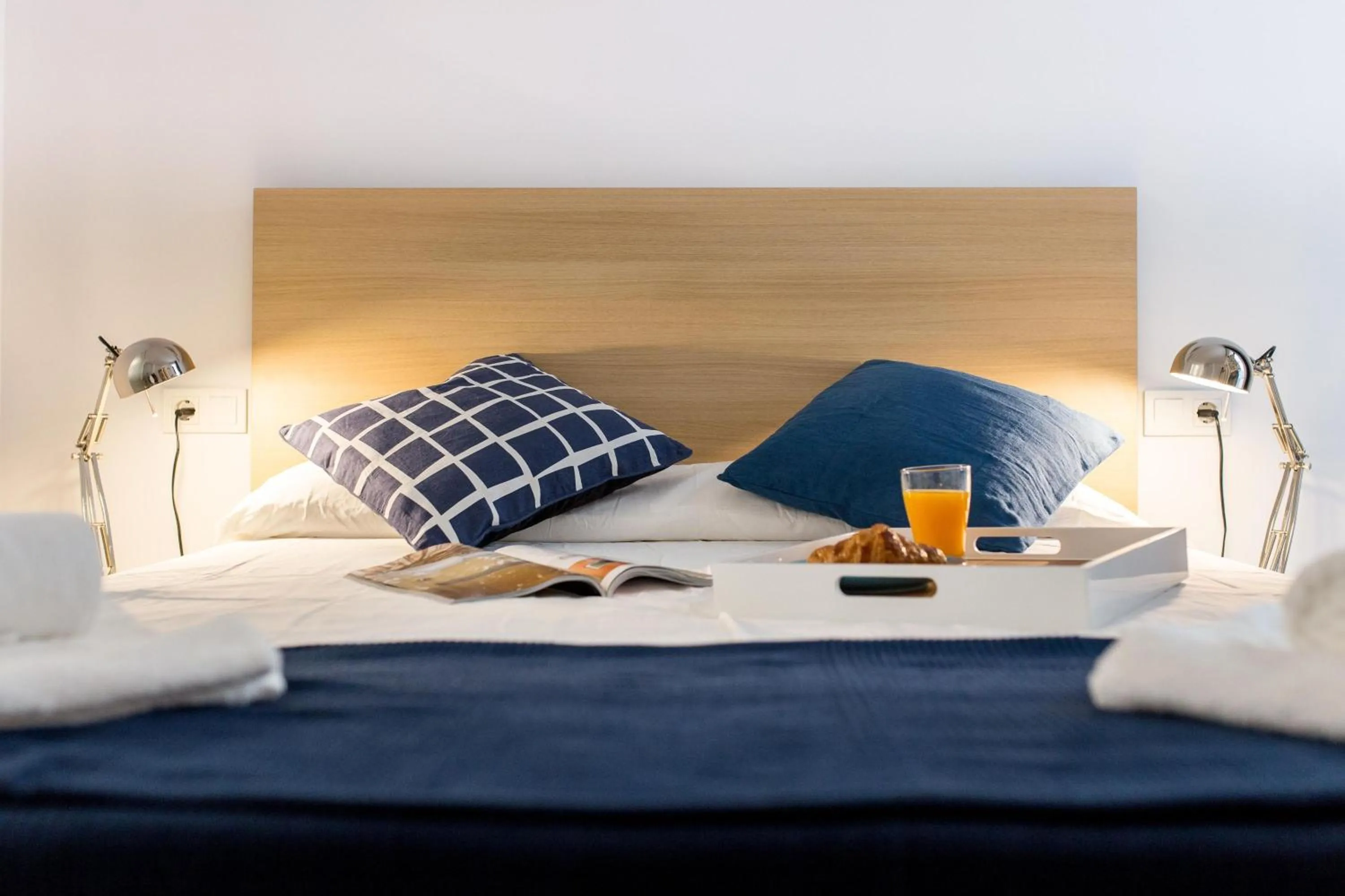 Bed in Oceanográfico Apartments