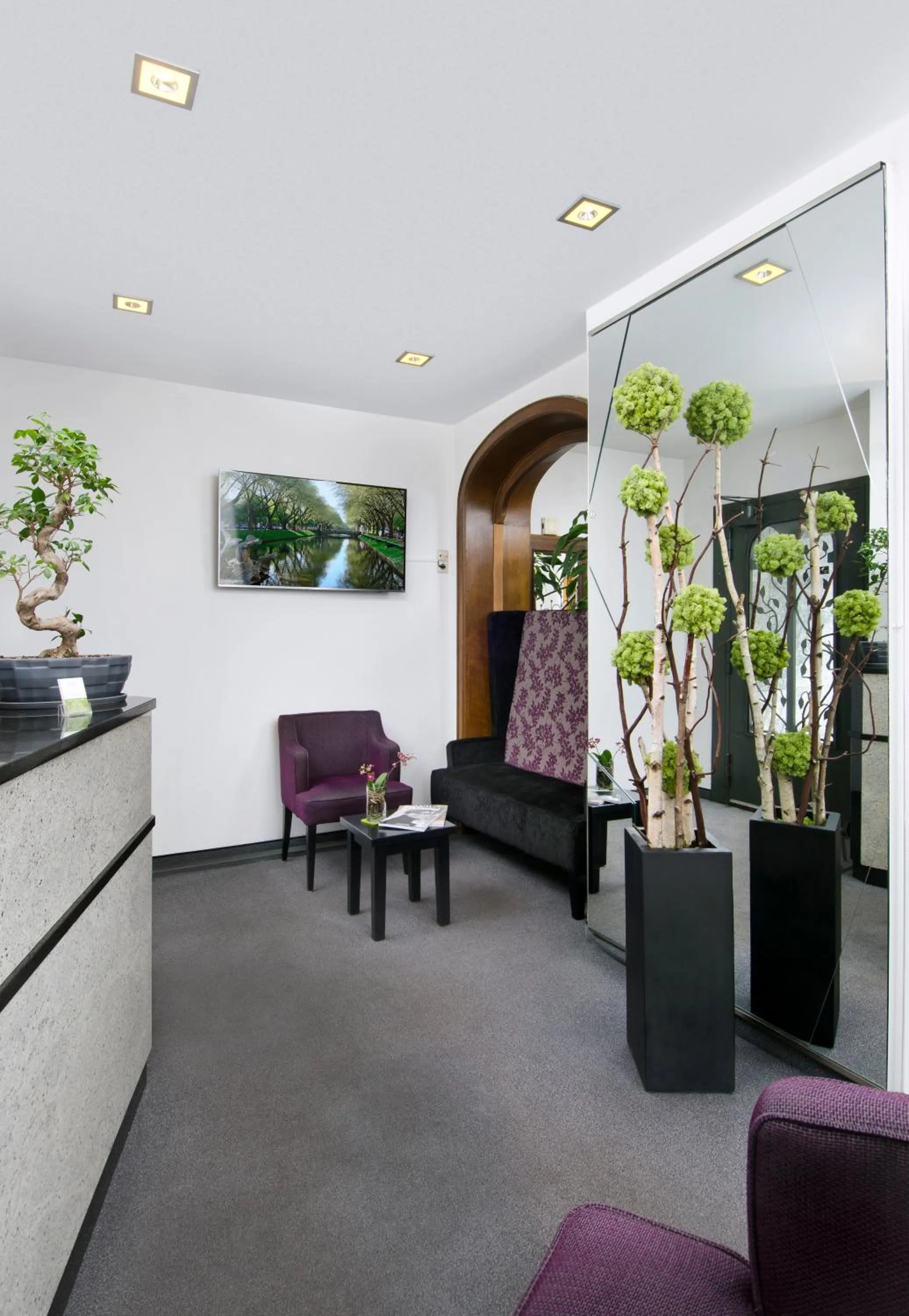 Communal lounge/ TV room in Hotel am Hofgarten